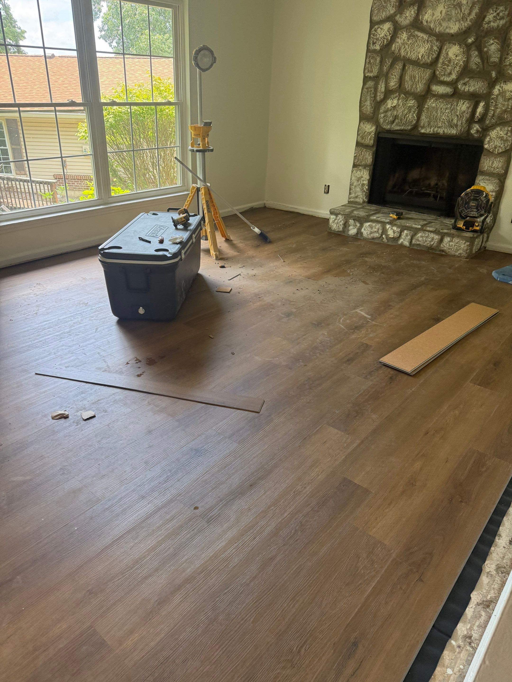 Complete Home Remodel Featuring Custom Kitchen and Wood-Look Plank Flooring by MAJO