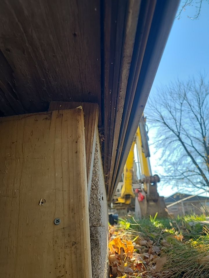 Lifting Home With Piers using Magnum Piers by Toledo Basement Repair