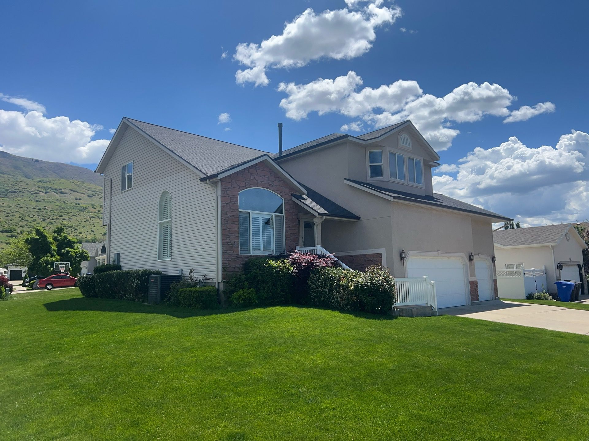 Farmington | Stucco/Vinyl Demo & Hardie Conversion | Cobble Stone & Black by Ideal Siding Utah