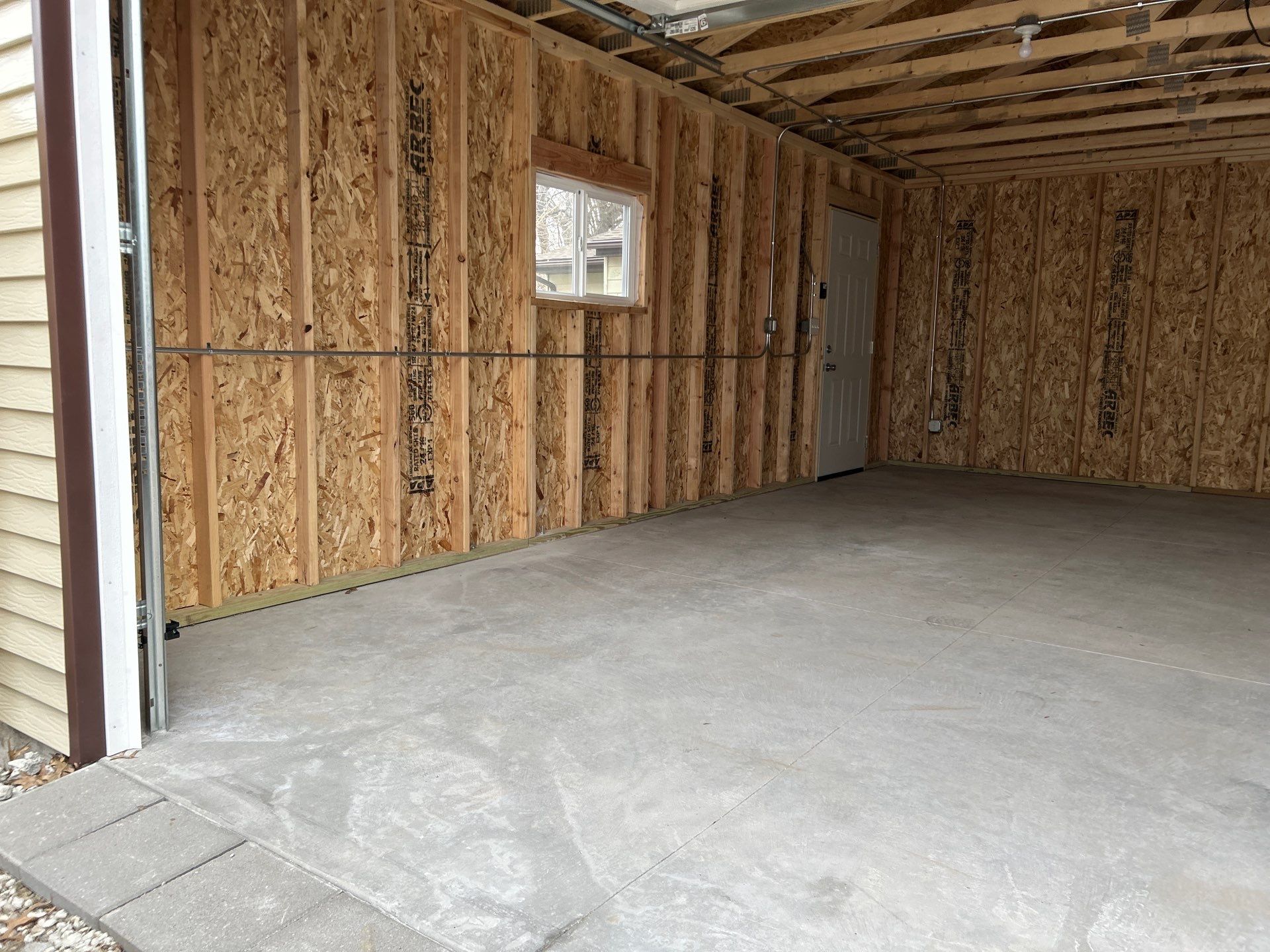 Bring Revival To Your Detached Garage  by Revival Concrete Coatings