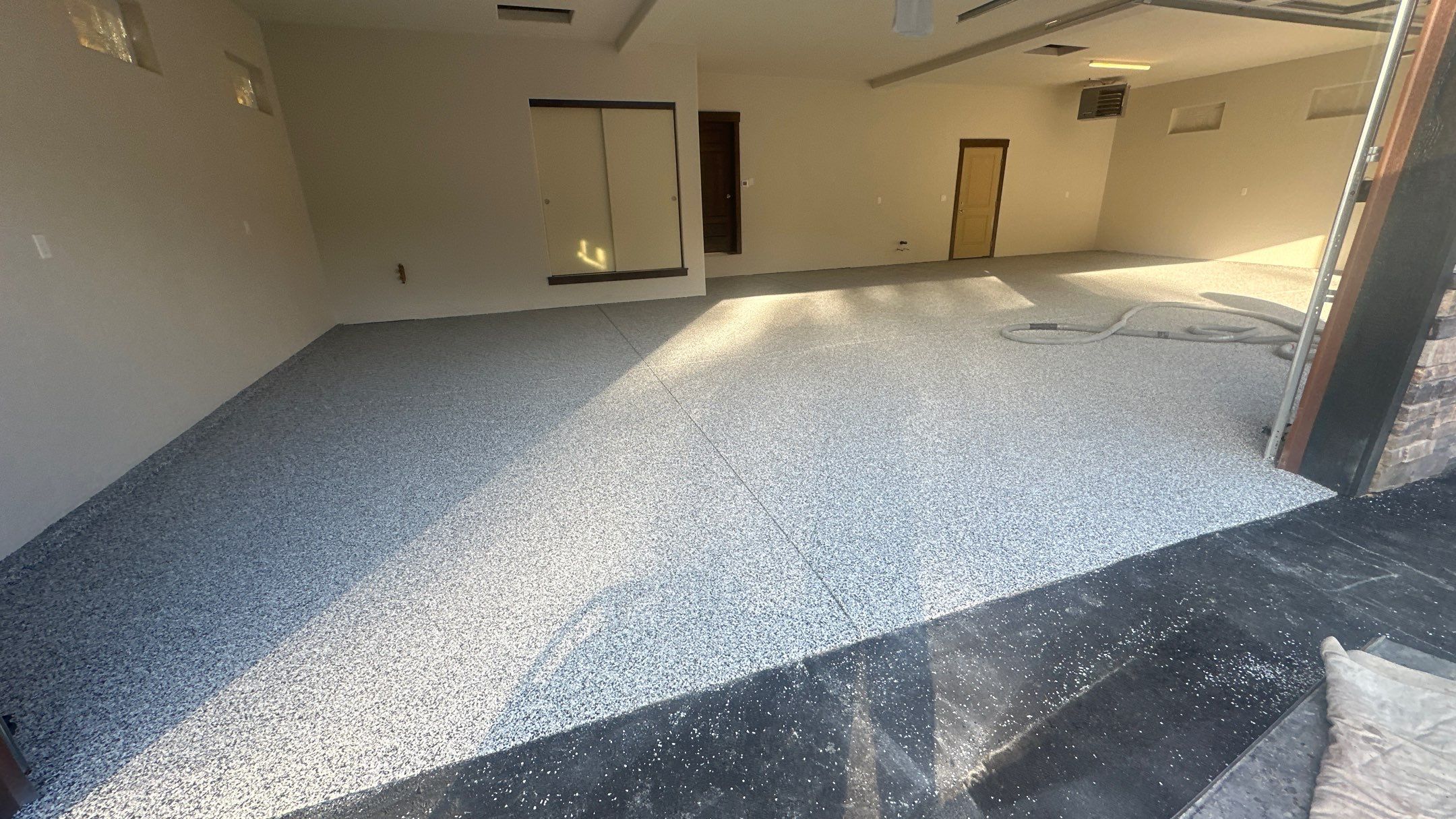 Garage Transformation using Domino by Croc Coatings, LLC