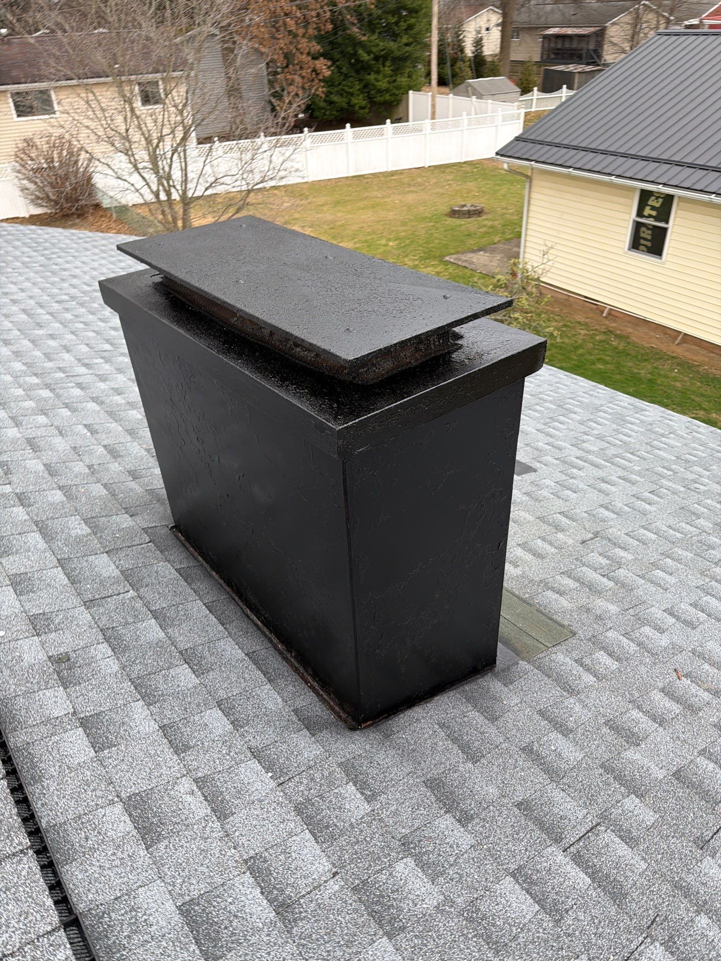 Residential Roofing Installation using EPDM and GAF Timberline HDZ Hickory by Rainstoppers Roofing