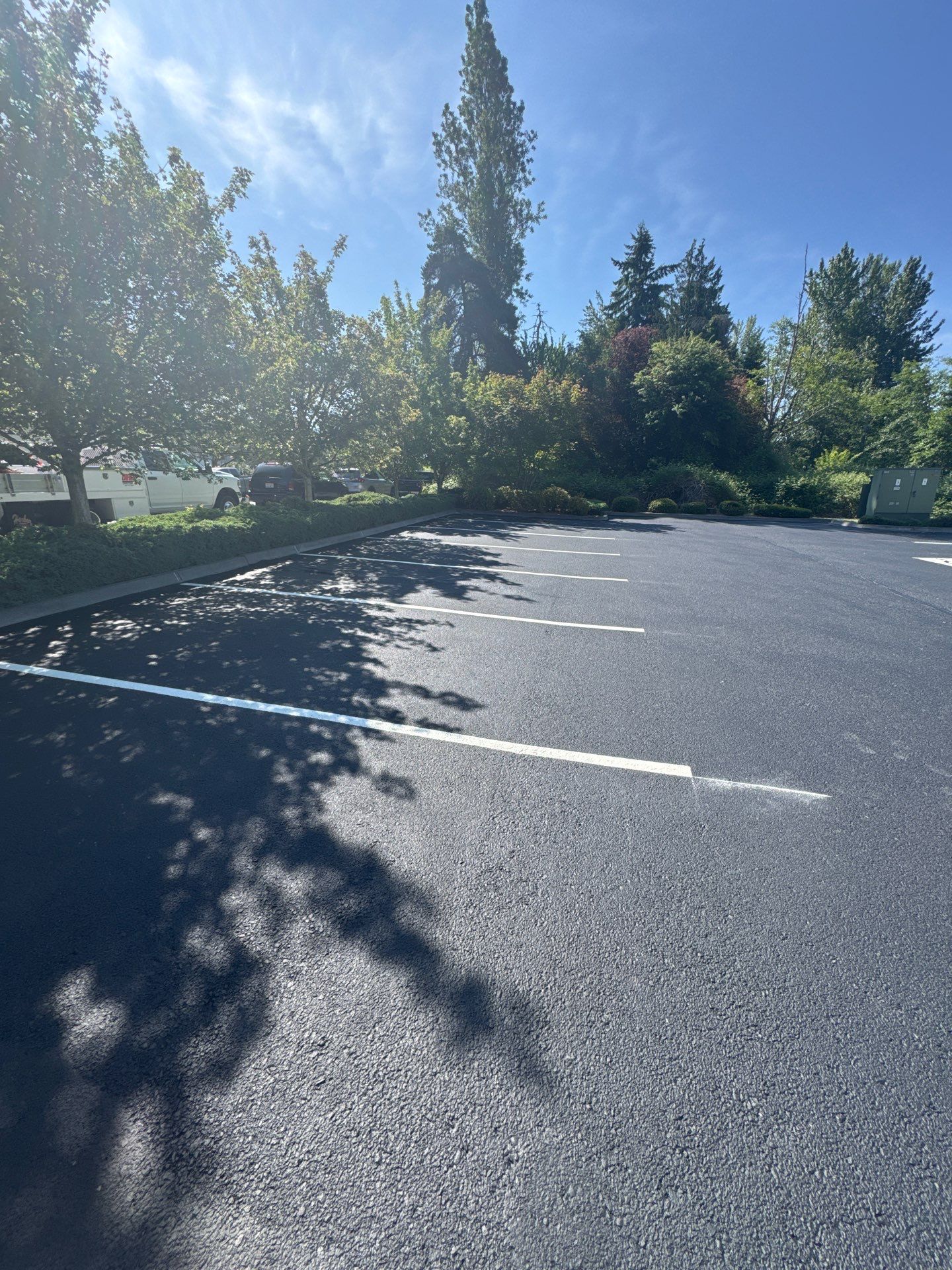 King Machine Business Parking Lot Sealcoat Overlay | Mukilteo by Jireh Asphalt & Concrete Inc 