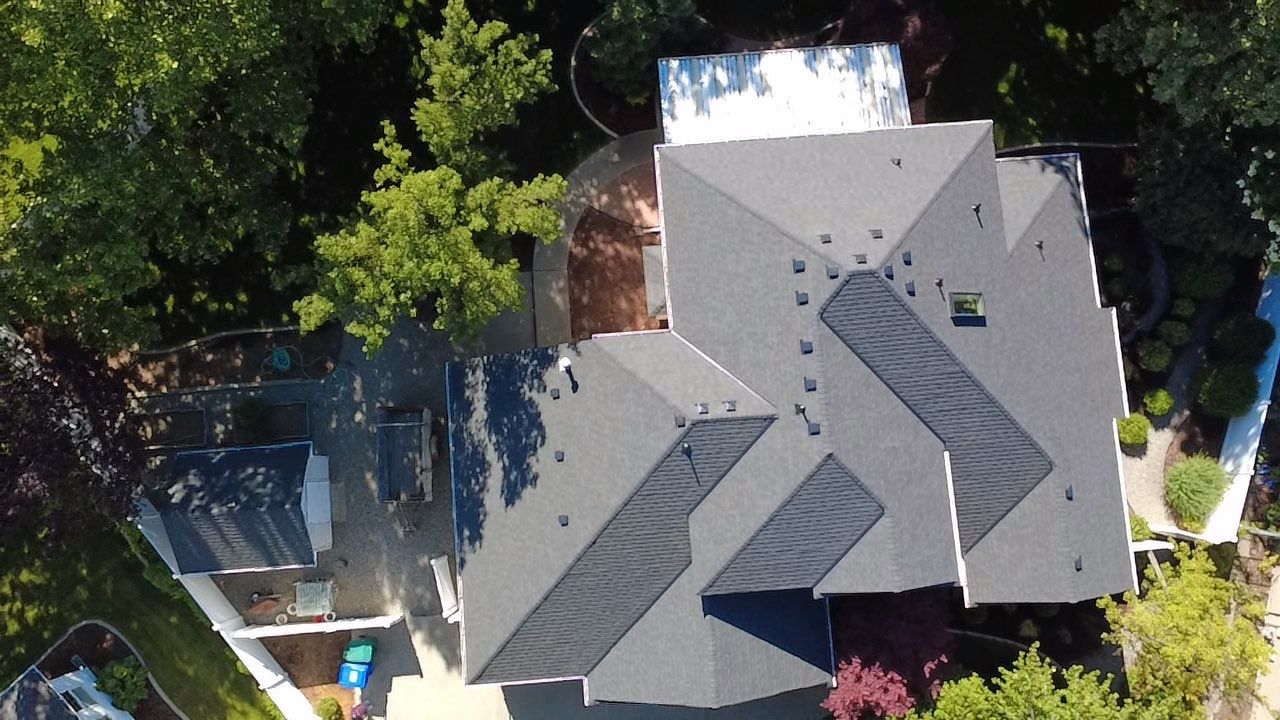 Asphalt Shingle Roof Replacement and Skylight Installation in Spokane Valley S Bannen Ct Spokane Valley WA 99037  The Denali System - Certainteed Landmark® Shingle- Moire Black by Alpine Roofing