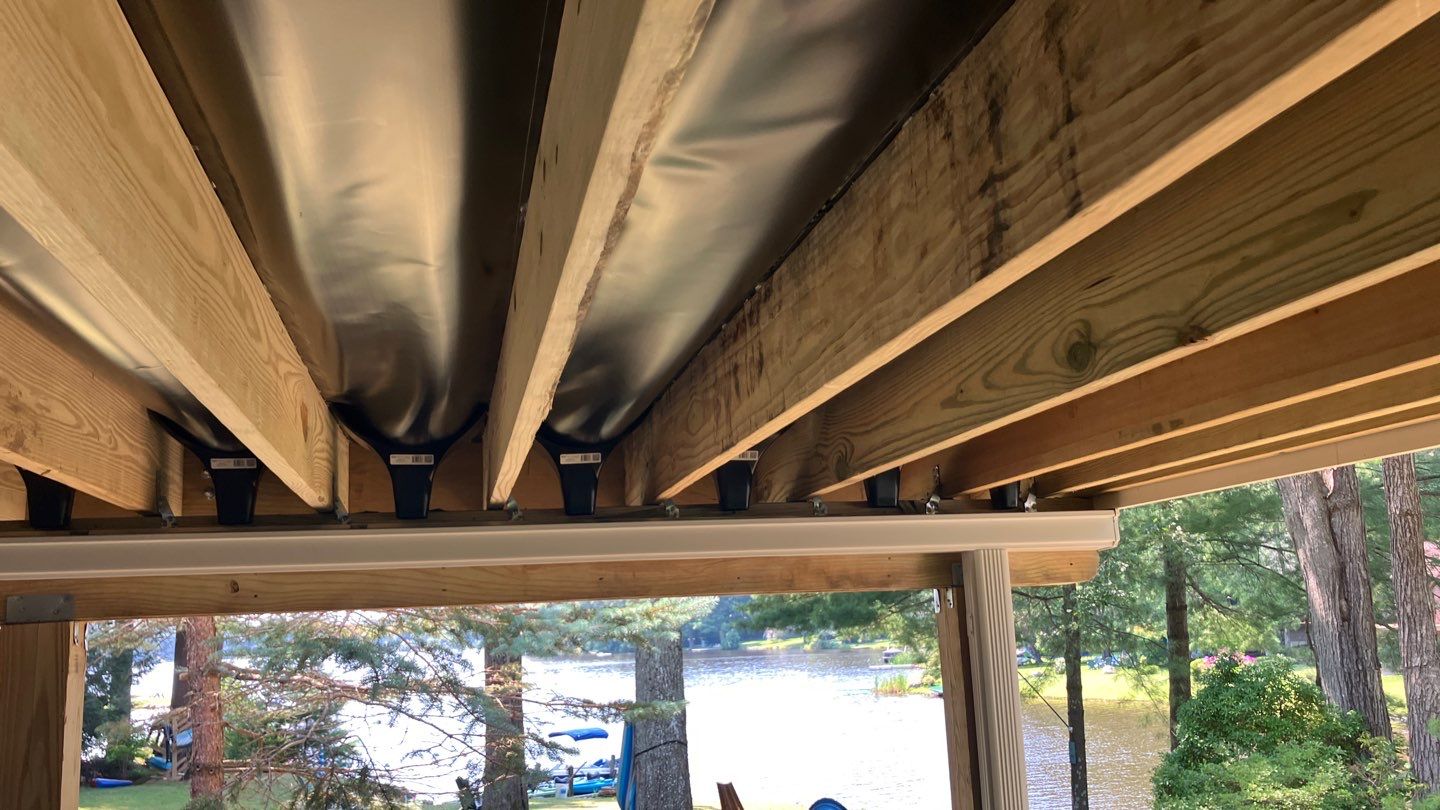 Deck replacement using Trex Transcend Rope Swing and Transcend Railings.Trex Rainescape by DiGiorgi Roofing and Siding Inc