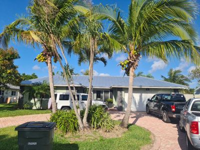 Residential Roofing Installation using 1" Nail strip metal roof
