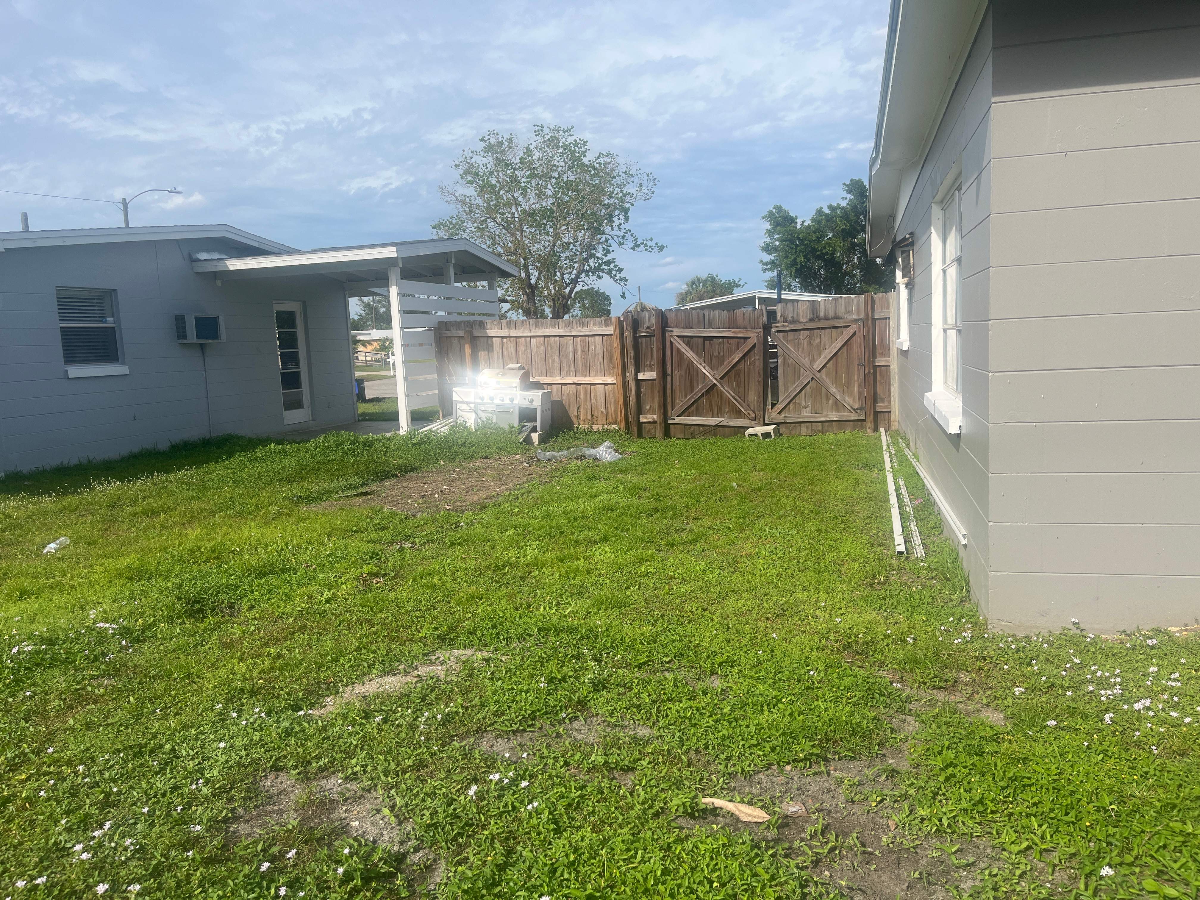 White Vinyl Privacy Fence Installation In North Port, FL by Asap fence and gates, LLC