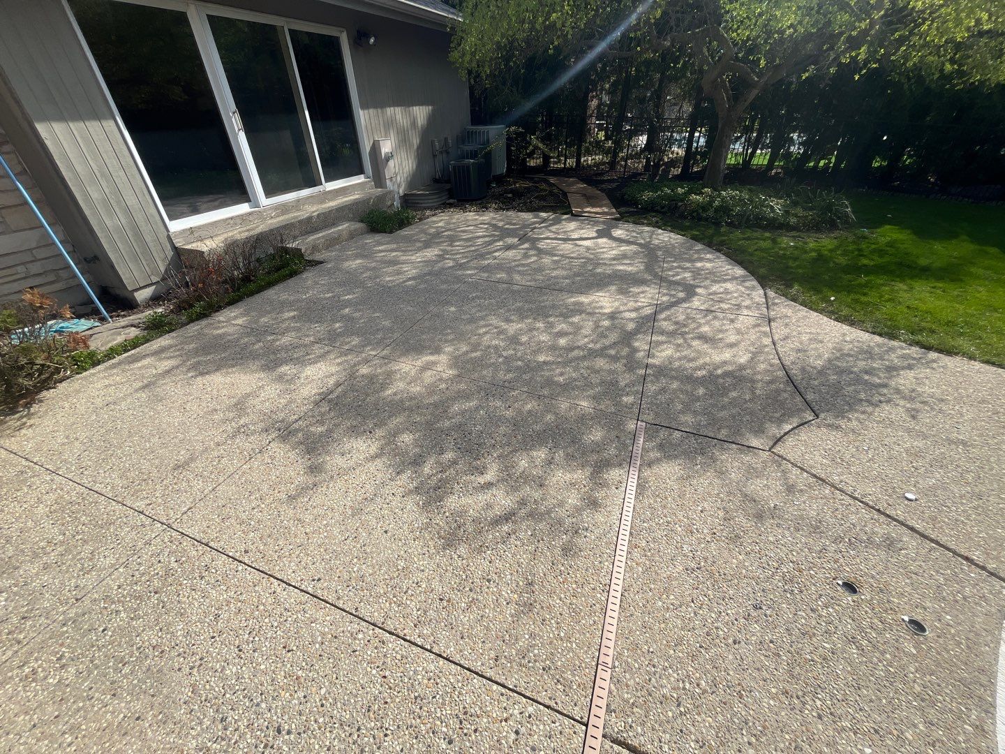 Aggregate Clean and seal using low gloss sealer by Northern Power Washing LLC.