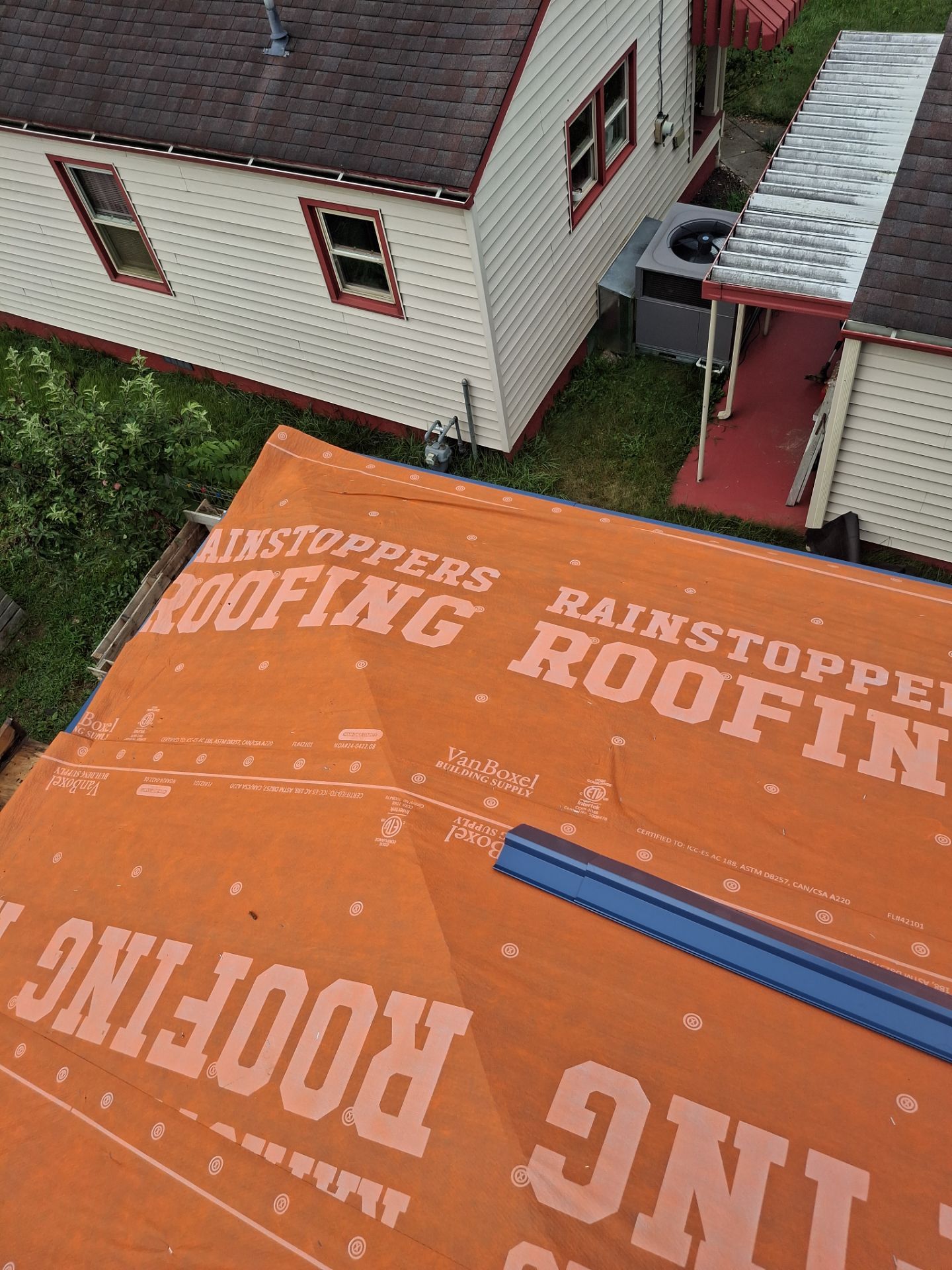 Residential Roofing Installation using Metal by Rainstoppers Roofing