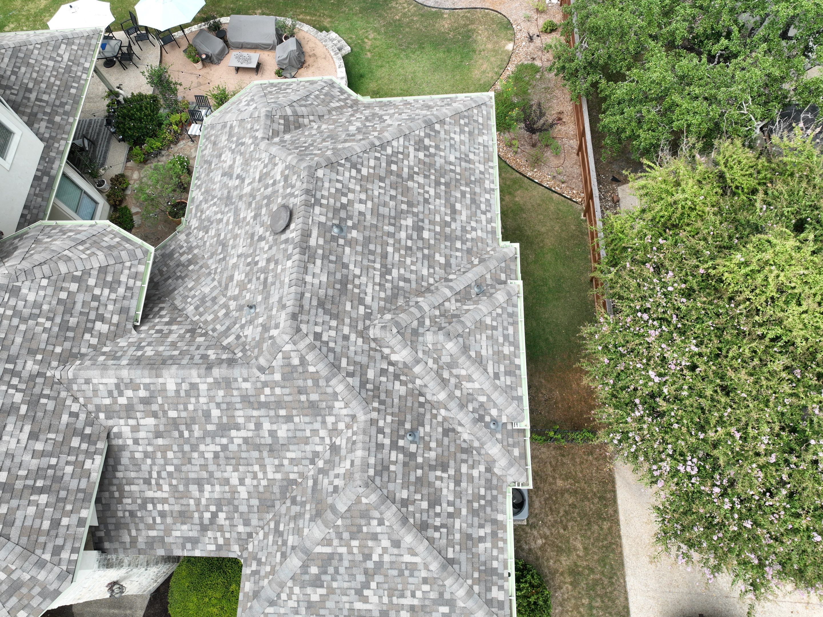 Residential Roof Replacement using 30 Year Laminate Shingles with High Profile Ridge by Premier Roofing and Contracting