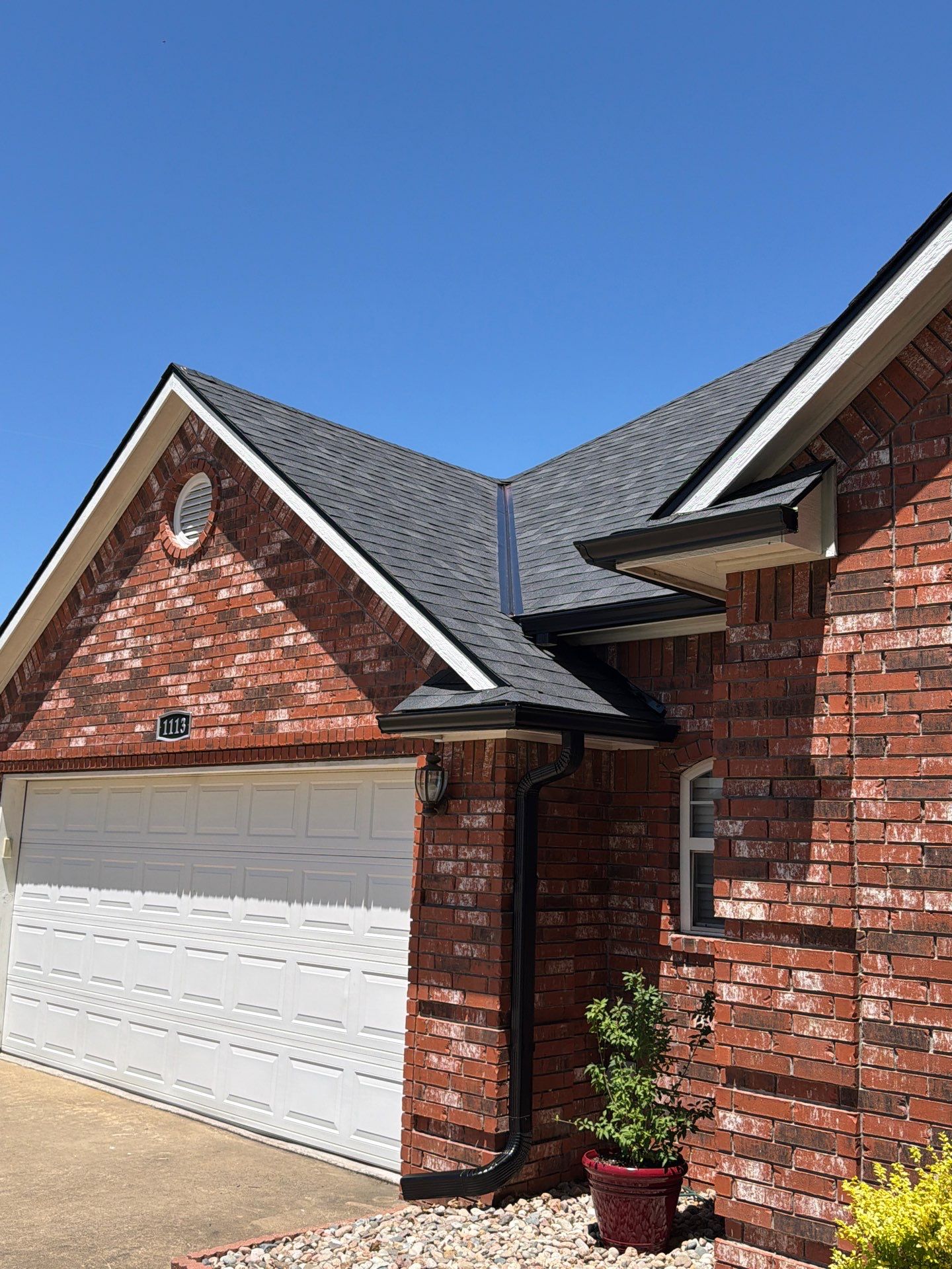Black roof & gutters!! by In & Out Construction & Remodeling, LLC