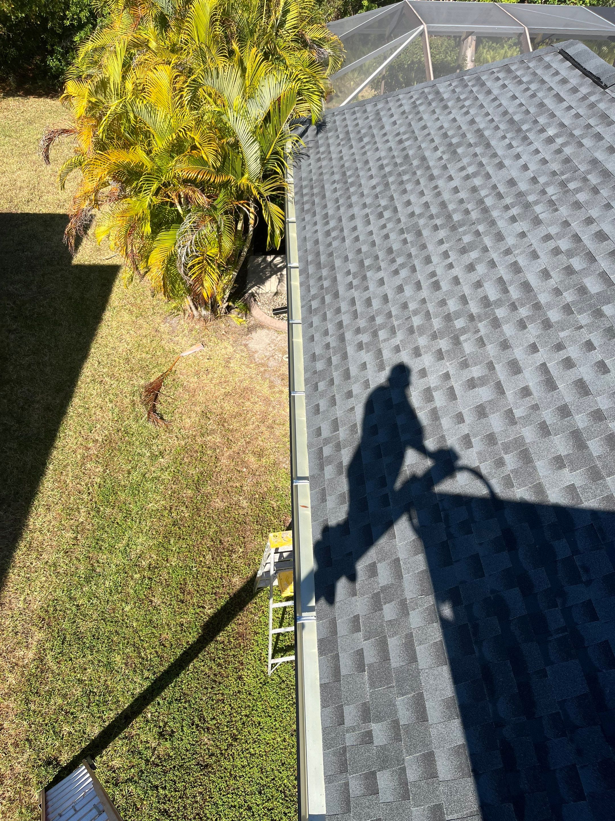 Black 6-inch Seamless Gutters for Modern Ellenton Homes FL by Gutter Professors