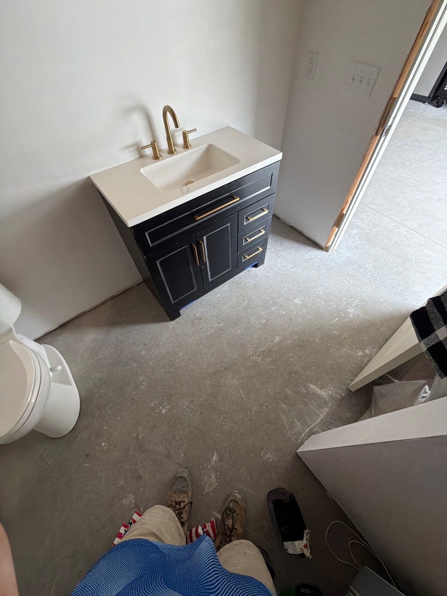 Multi-Room Epoxy Flake Floor Installation Throughout Pentwater Residence by Gordon Painting