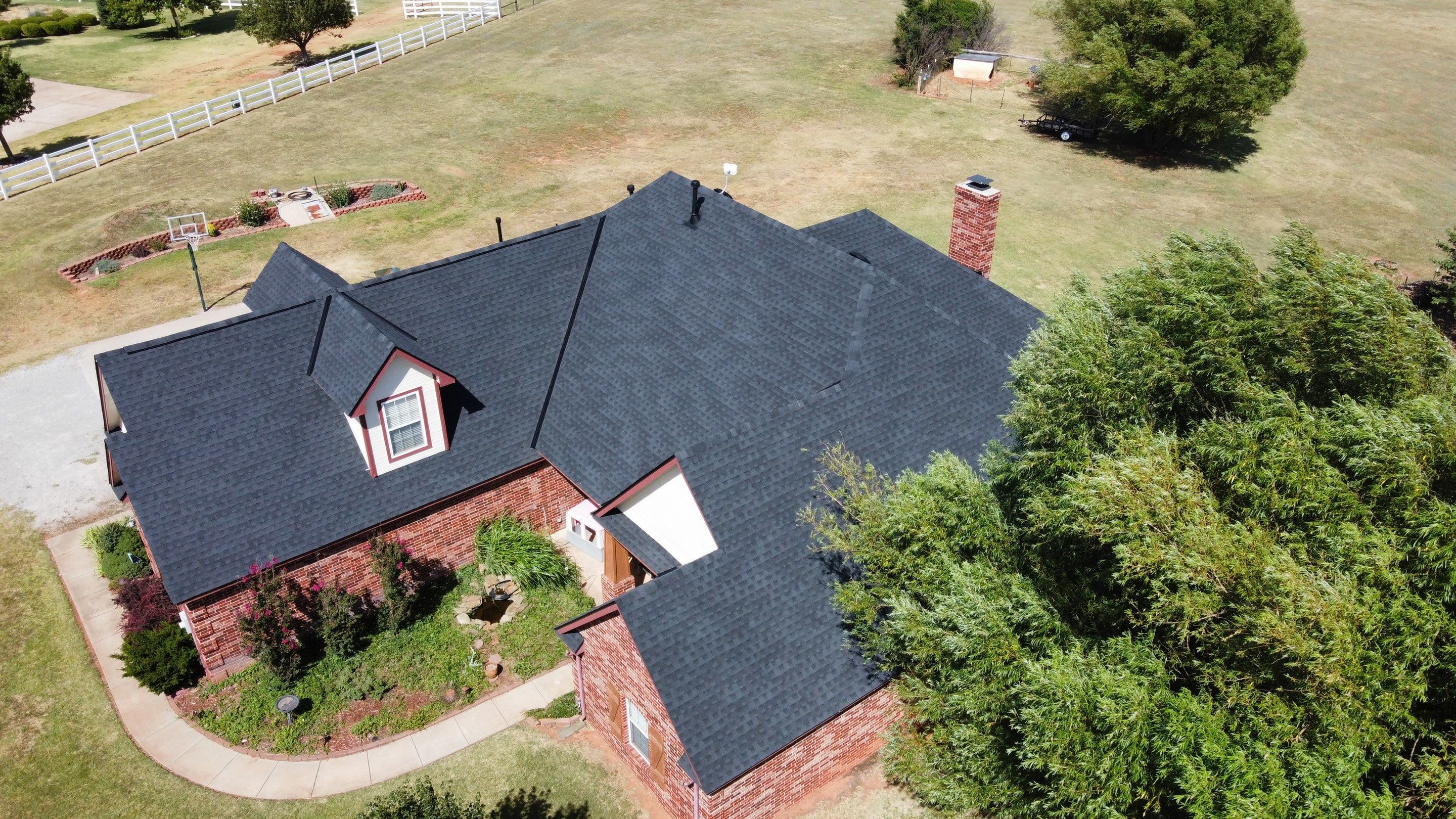Residential Roofing Installation using GAF Natural Shadow  by A & H Roofing and Contracting