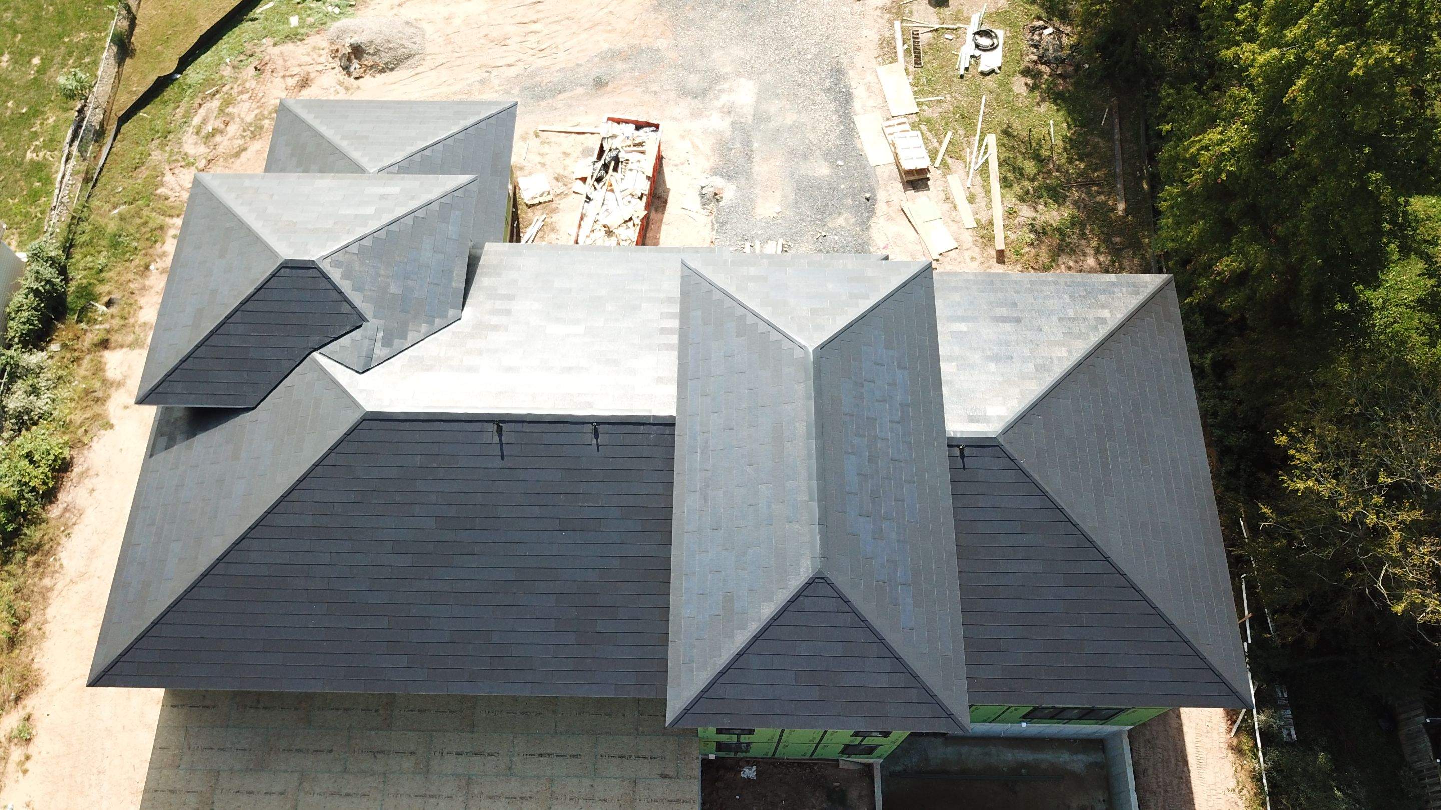 Tesla Solar Roof  using Tesla Solar Roof V3 tiles by American Home Contractors