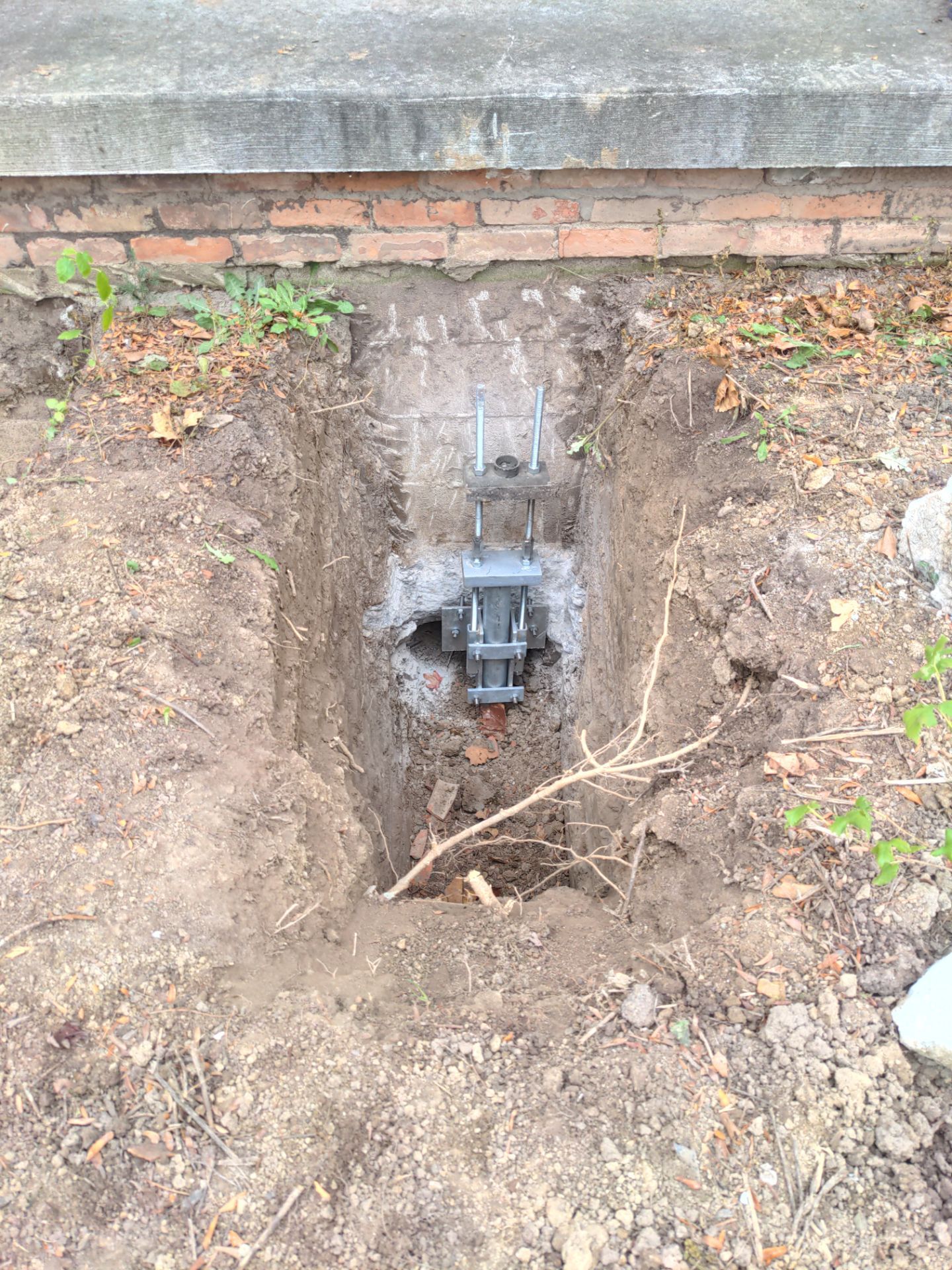 Helical Piers and Pillar Lift using Helical Foundation Footings by Toledo Basement Repair