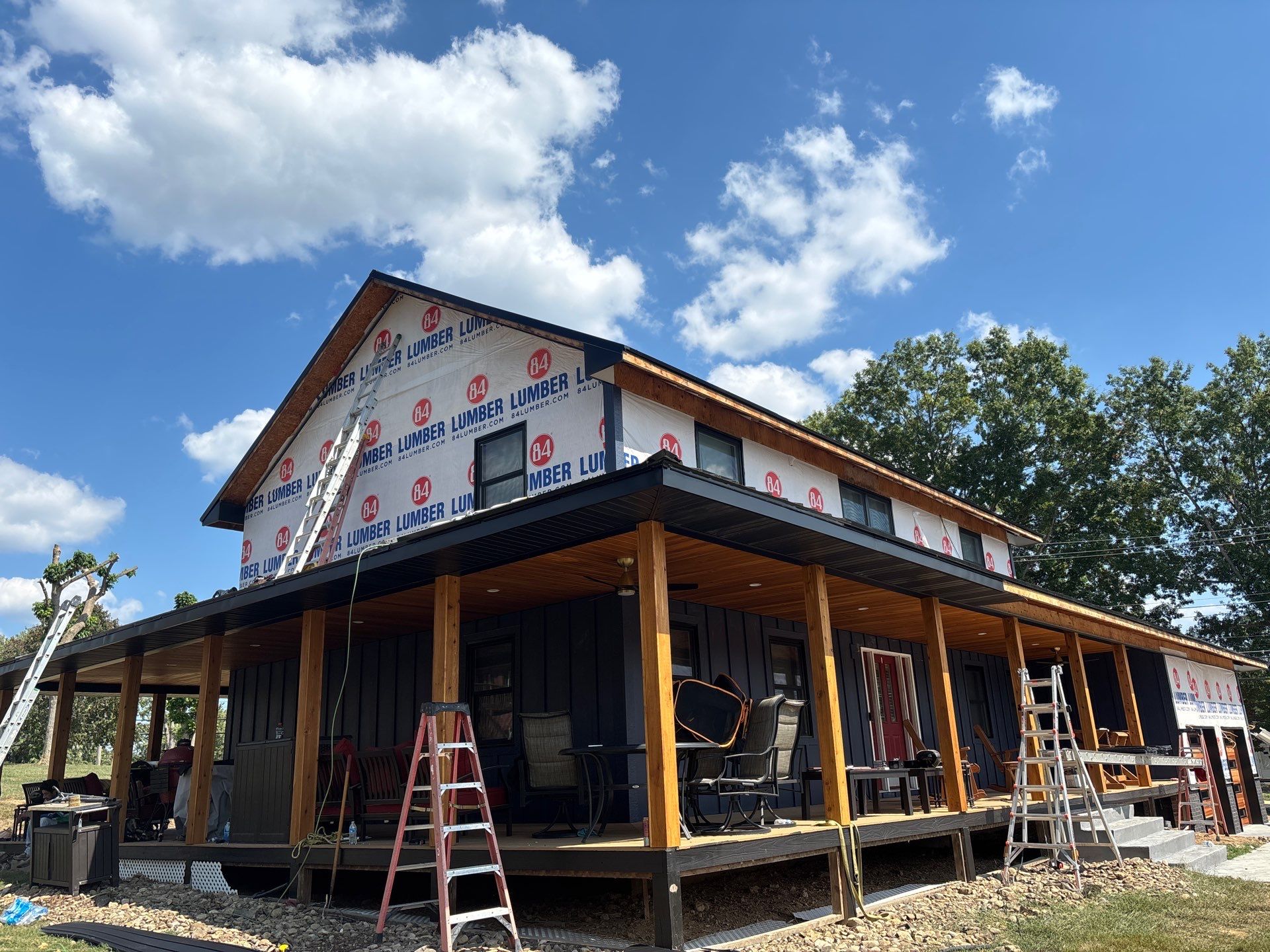 Siding and Metal Roof by Fahey Roofing + Contracting