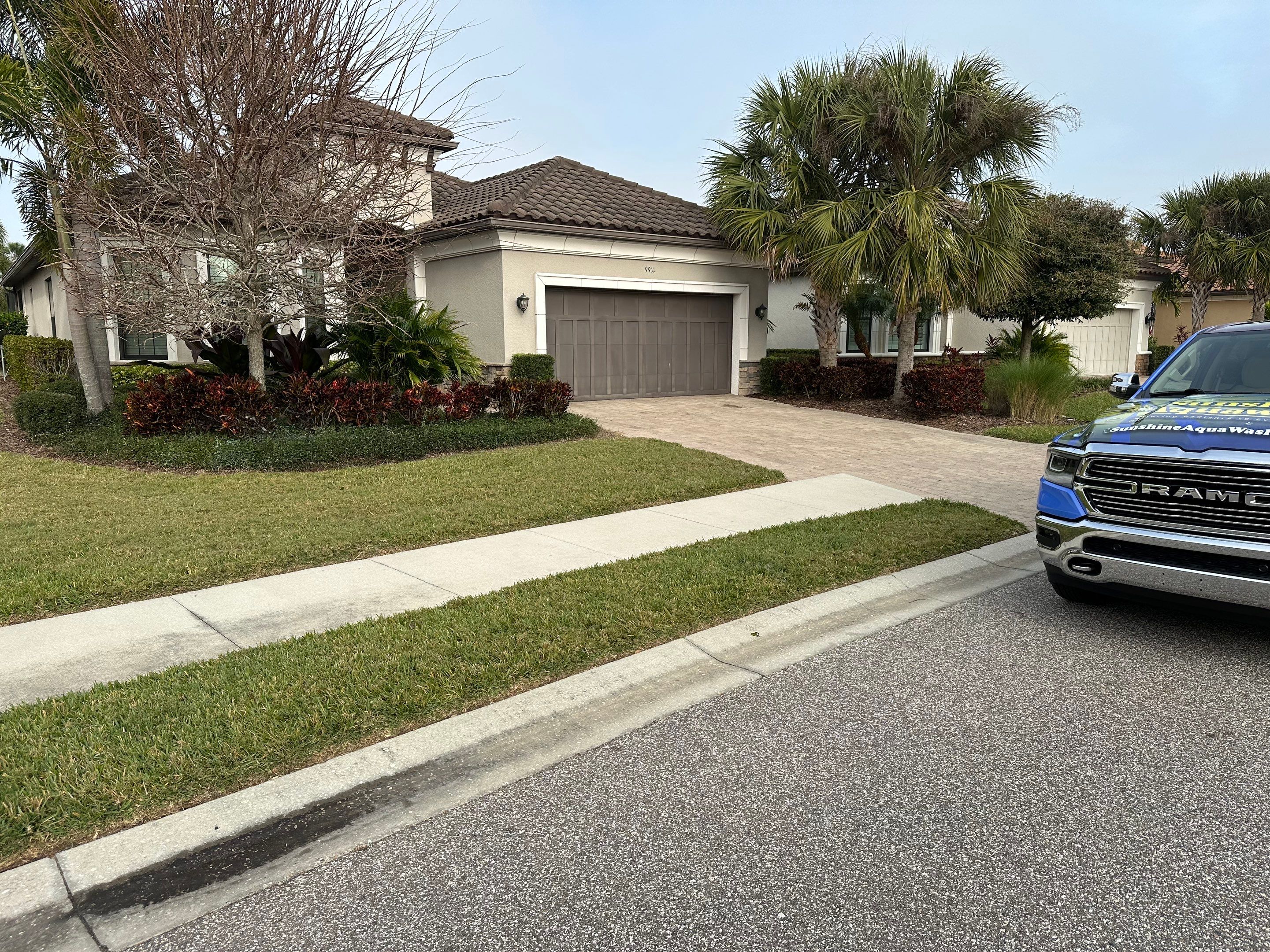 Concrete Tile Roof, Paver Pool Deck, Screen Enclosure & Driveway Cleaning in Artisan Lakes Esplanade, Palmetto, FL | Sunshine AquaWash by Sunshine AquaWash