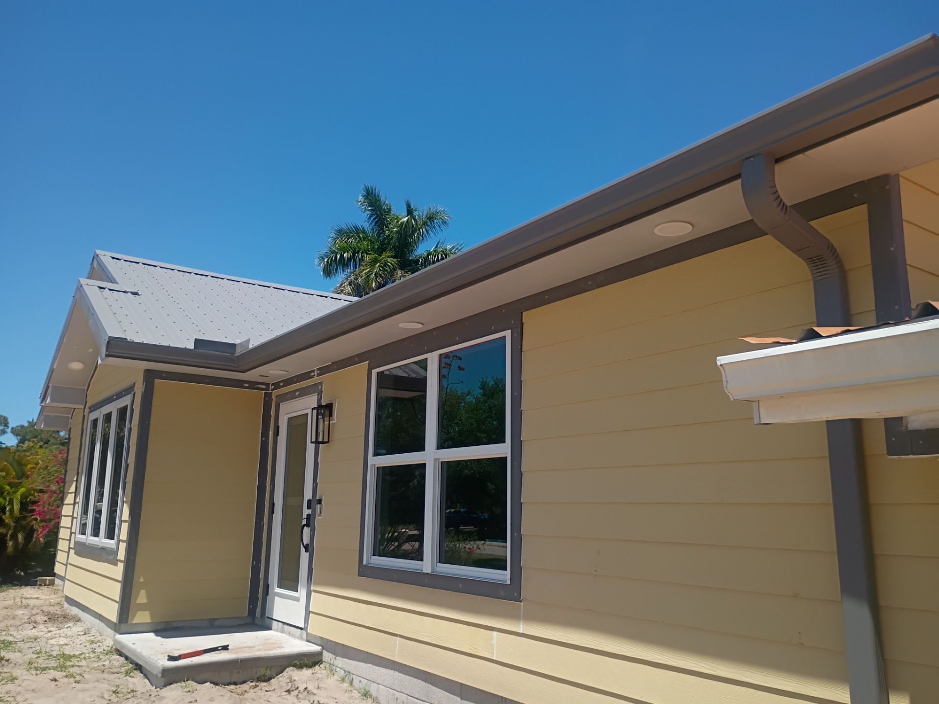 Musket Brown Seamless Gutters Installation in Saint James City, FL  by Gutter Professors