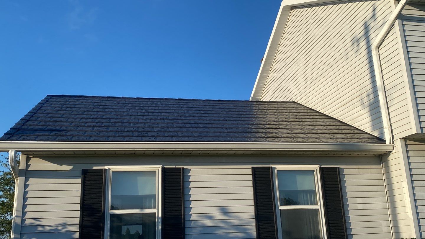 Residential Roofing Installation using Metstar Slate Plus Smooth Black by Nitro Roofing and Construction