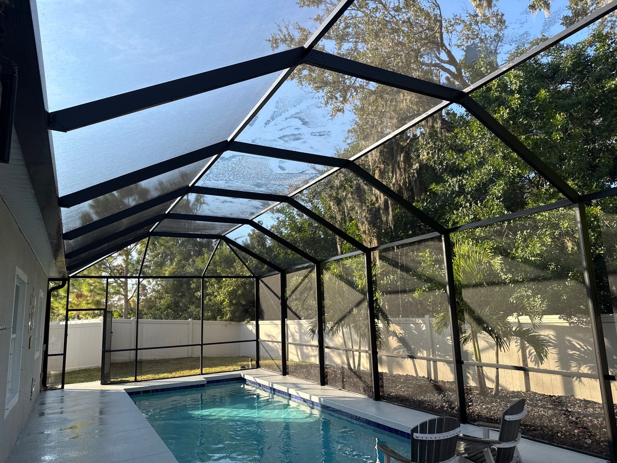 Painted Pool Deck & Screen Enclosure Cleaning | Heron Creek, Palmetto FL by Sunshine AquaWash