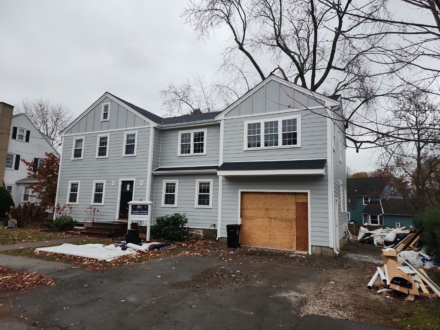 Siding and Roof for house with new addition in Milton, MA by UBrothers Construction
