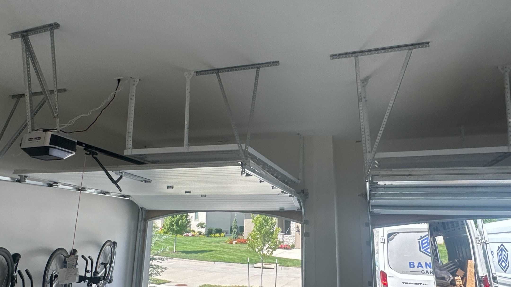 New bike storage for Jason E. along with some overhead racks  by Banner Garage