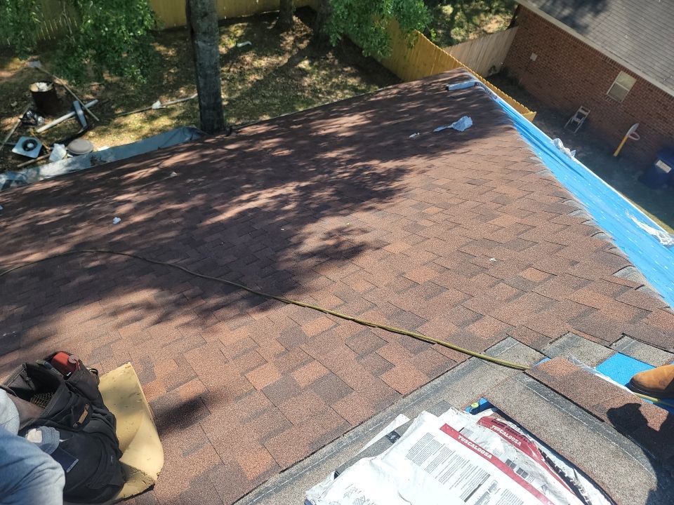 Residential Roofing Installation using Roof Replacement by American Roofing & Construction LLC