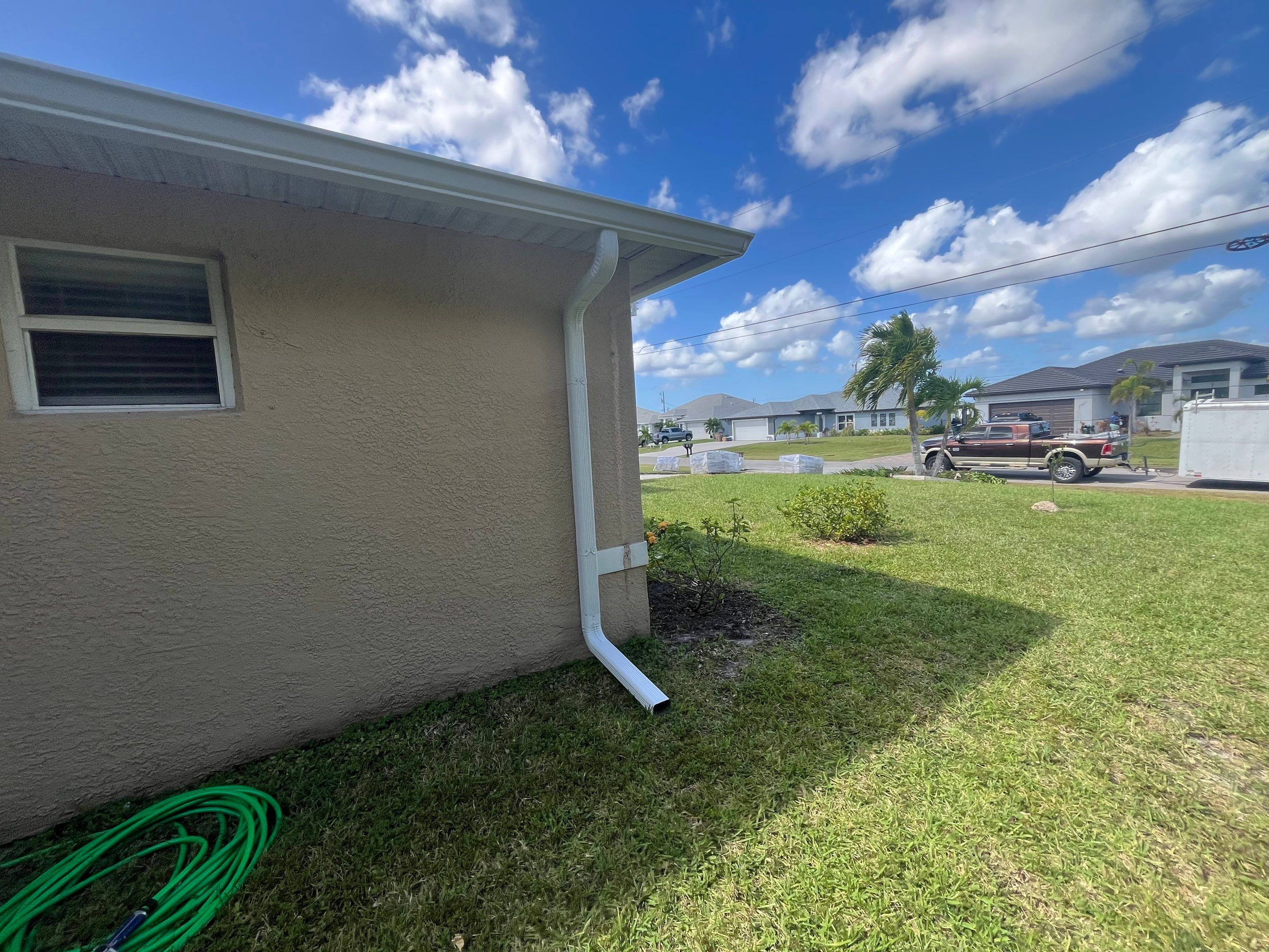 Downspout Extensions for Cape Coral Homes  by Gutter Professors