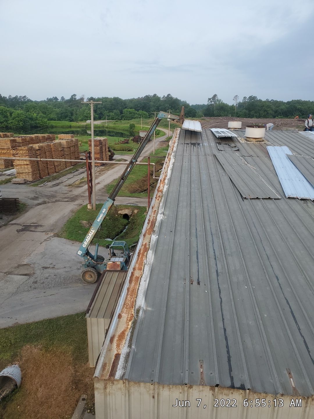 Commercial Roofing Installation using Aluminum Roofing panels by Hostetler Roofing