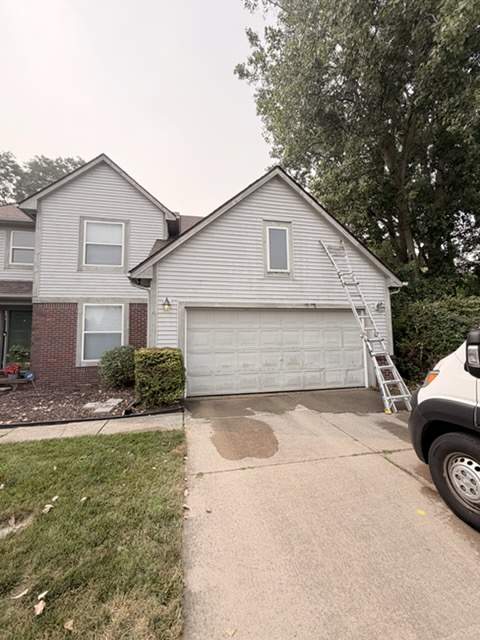 Exterior Siding and Wood Trim Restoration in Ypsilanti by Top Shelf Painter