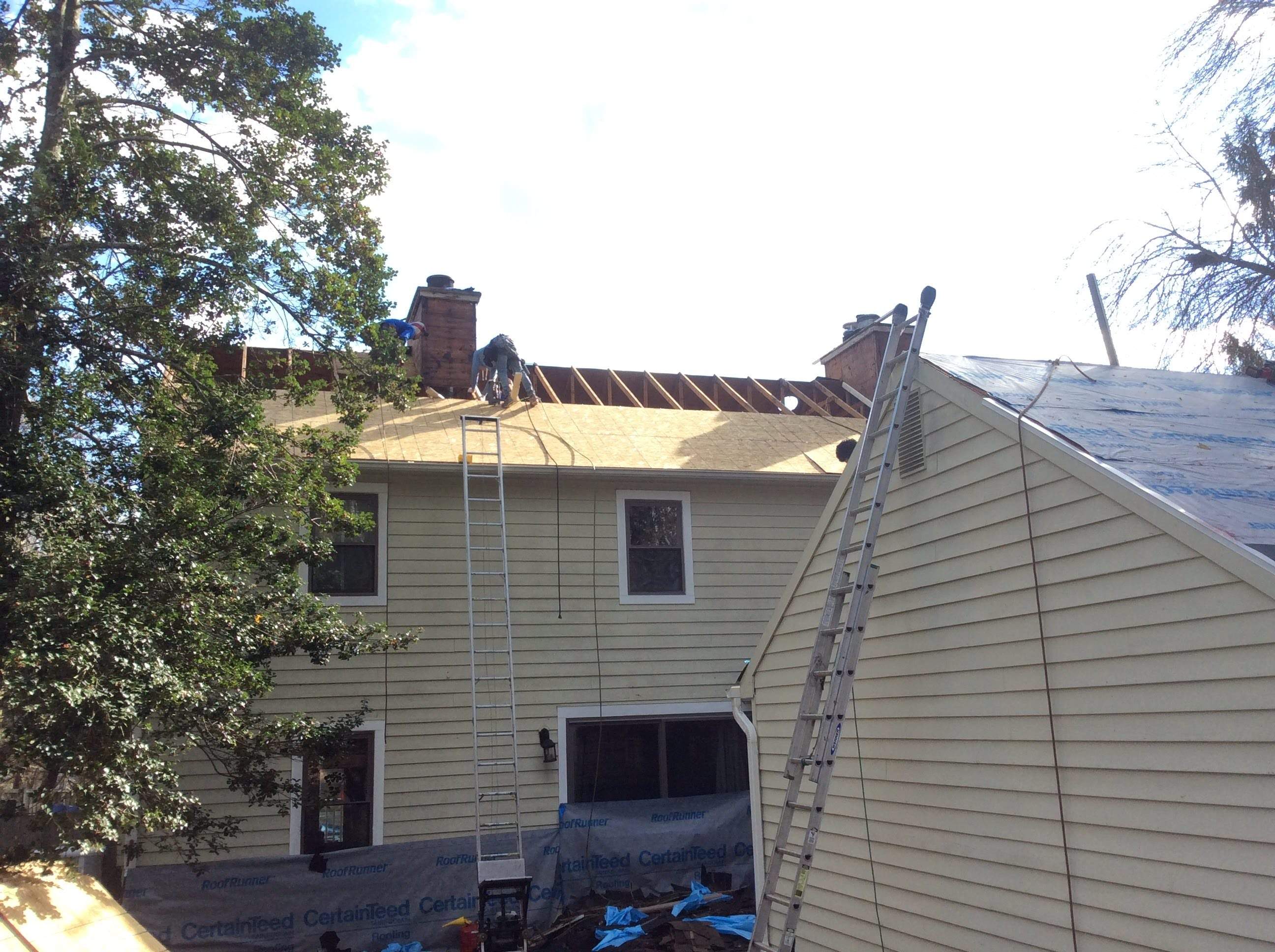 Residential Roofing Installation using Pewterwood Shingles  by Alpha Design Services