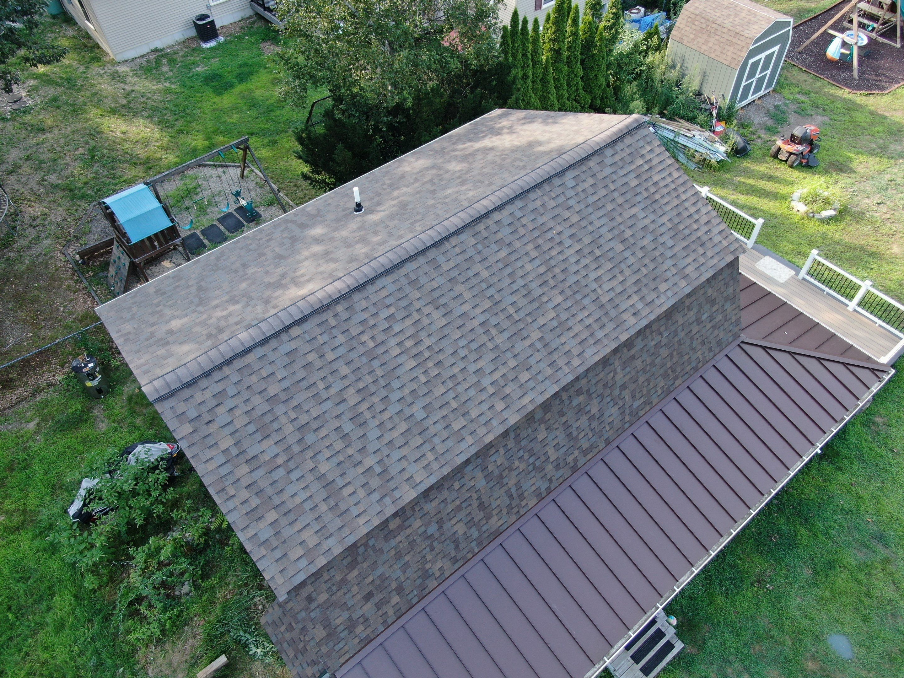 Full Roof Replacement & Farmers Porch Restoration – Asphalt + Standing Seam Metal by Mighty Dog Roofing of Greater Middlesex County