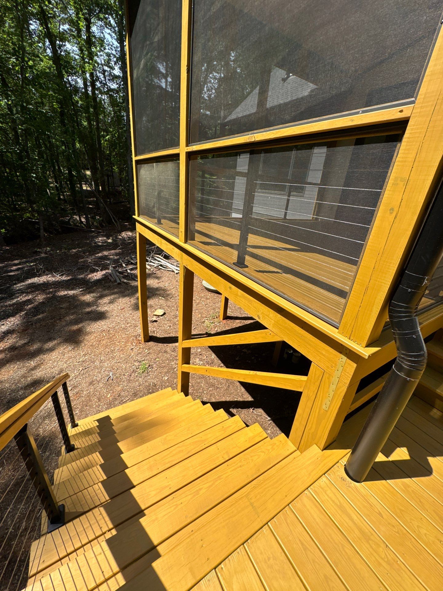 Porch and Deck staining  by GonzalezPainters & Contractors Inc 