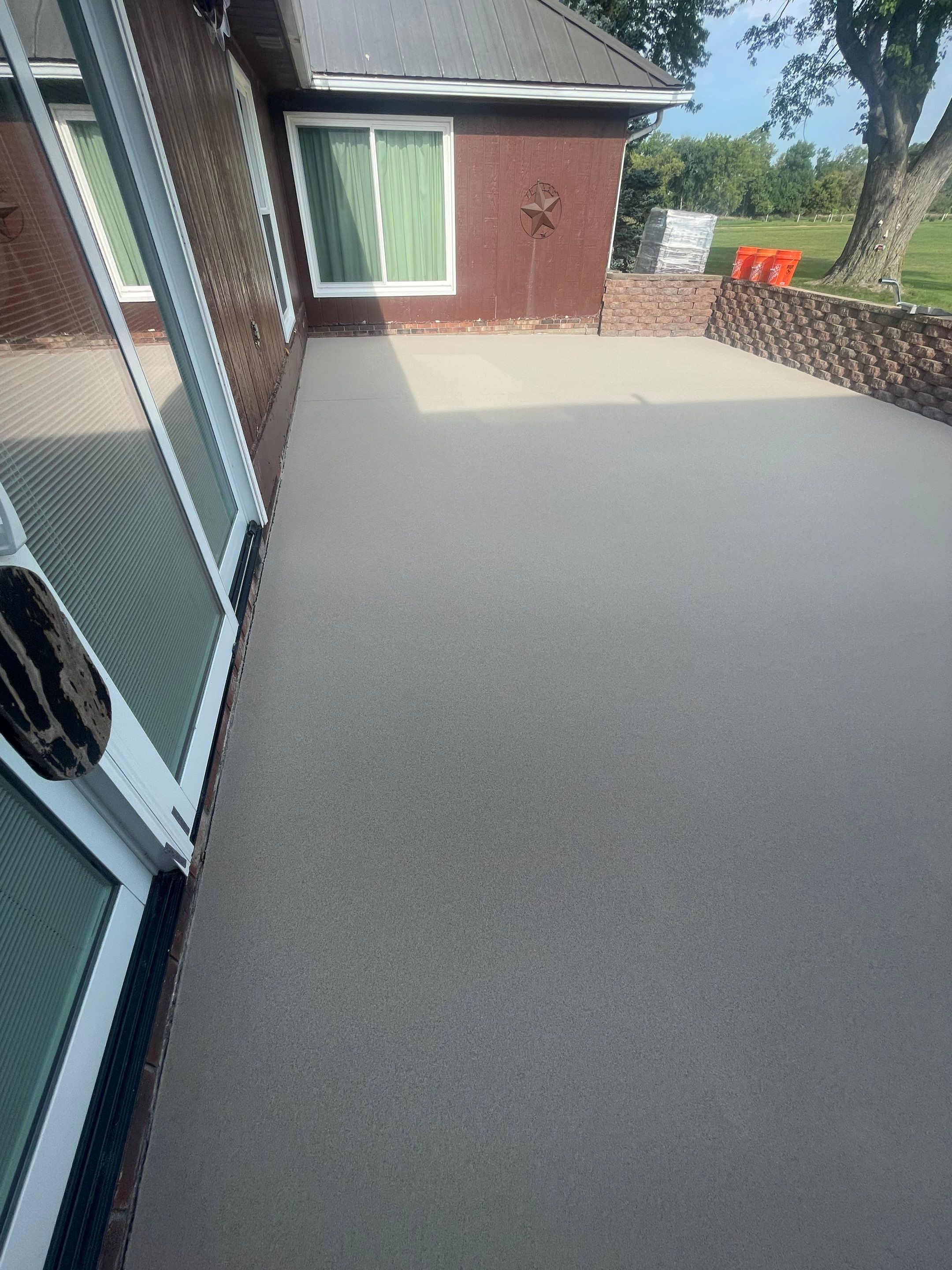 Concrete Patio Resurfacing and Protective Coating in Winfred, South Dakota by Select Painting, Coatings & Garage Cabinets