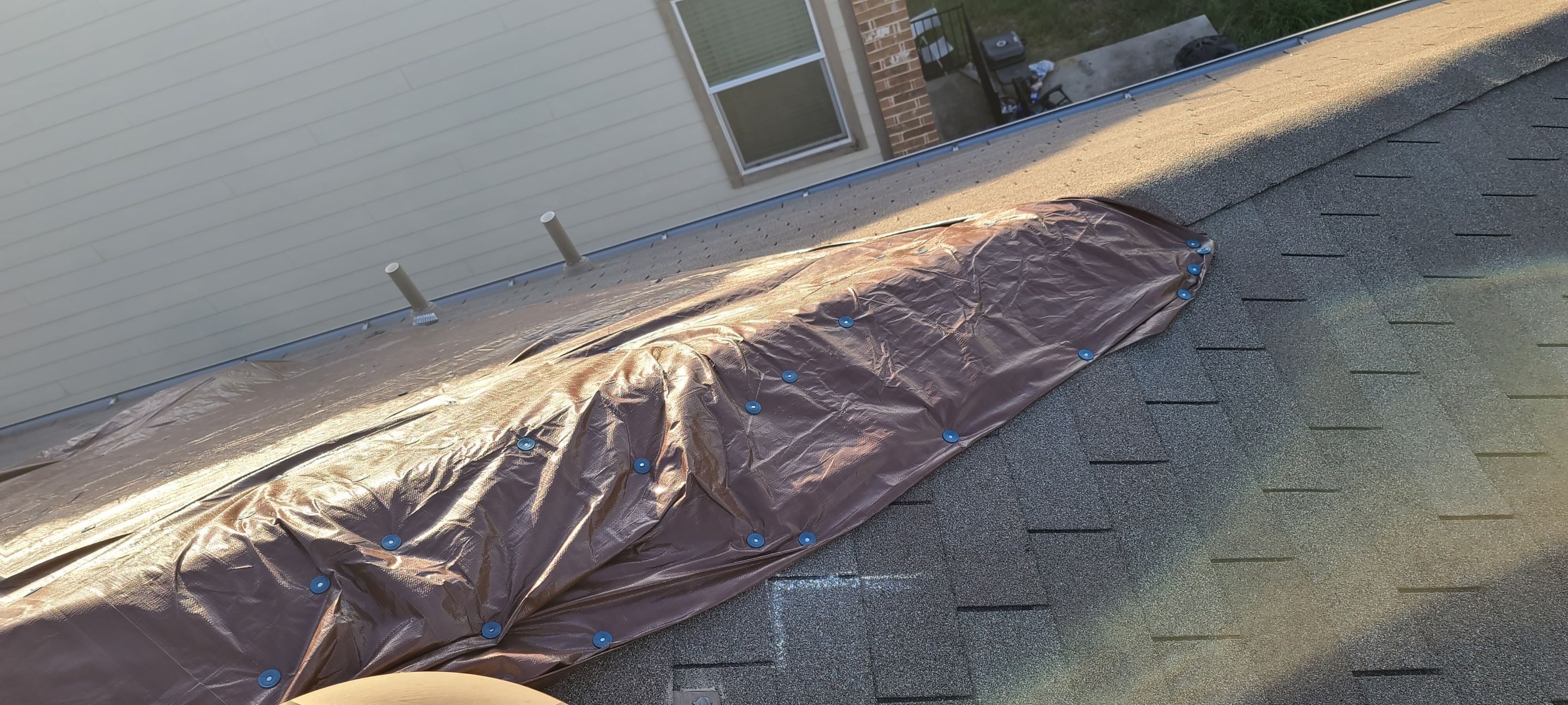 Austin Roof Storm Damage Assessment and Emergency Tarping Service by Caliber Restoration LLC