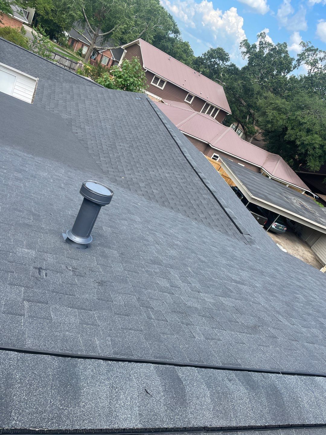 Residential Roofing Installation using Roof Replacement by American Roofing & Construction LLC