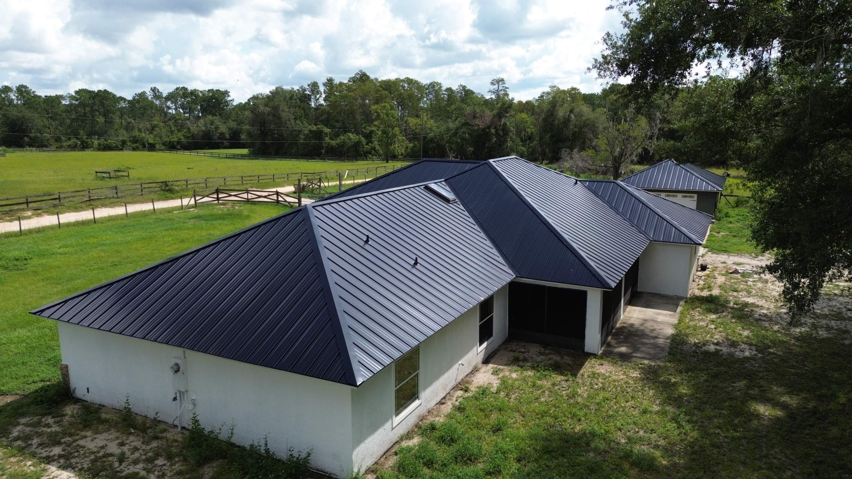 Residential Reroof | Architectural Shingles to 26 Gauge Standing Seam Metal | Groveland Fl by Gold Key Roofing