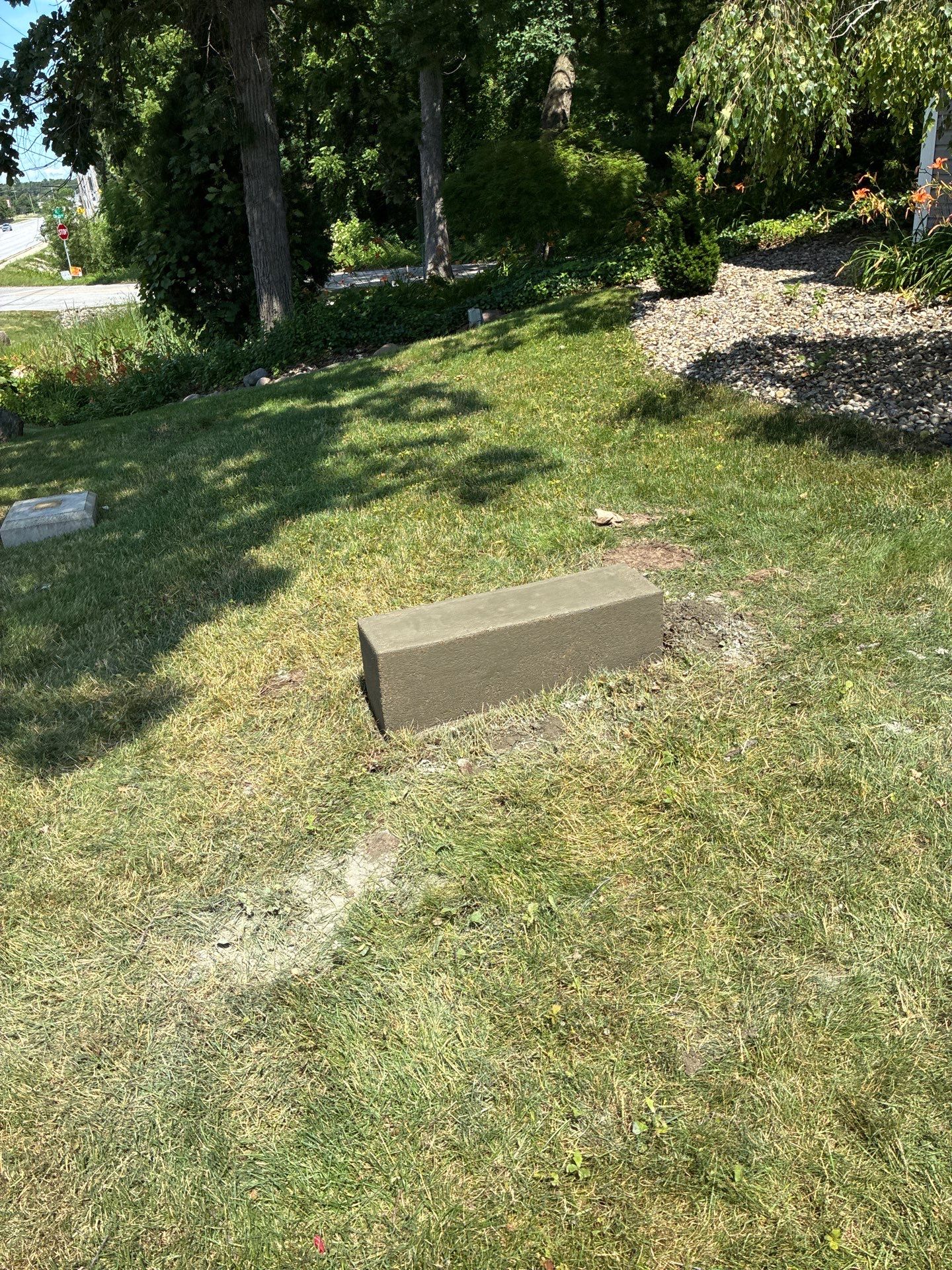 Custom Monument Signage and Concrete Foundation Installation in Granger by Hayes Design co