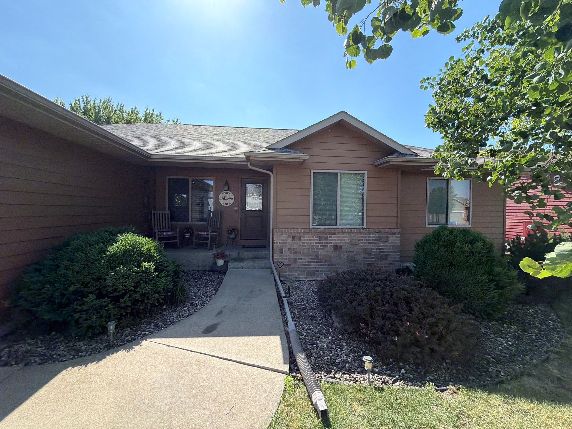 Full Exterior Residential Painting and Siding Refresh in Tea by Select Painting, Coatings & Garage Cabinets