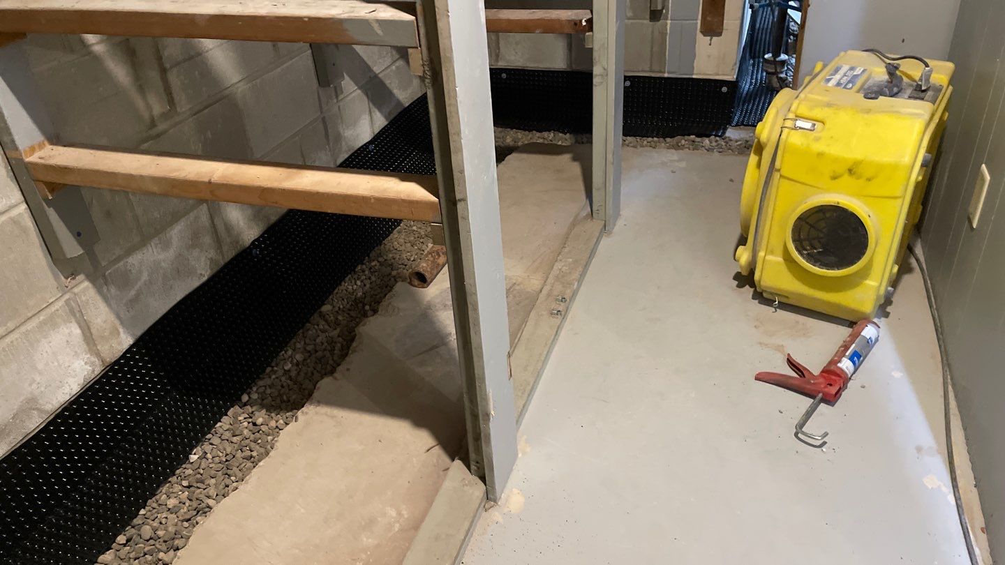Drain Tile, Sump Pump & Buried Discharge in Columbia Heights by Waterproofing Northeast