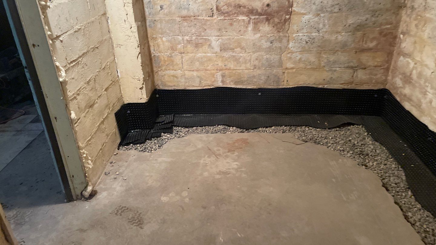 Interior Drain Tile for a South Minneapolis Basement by Waterproofing Northeast
