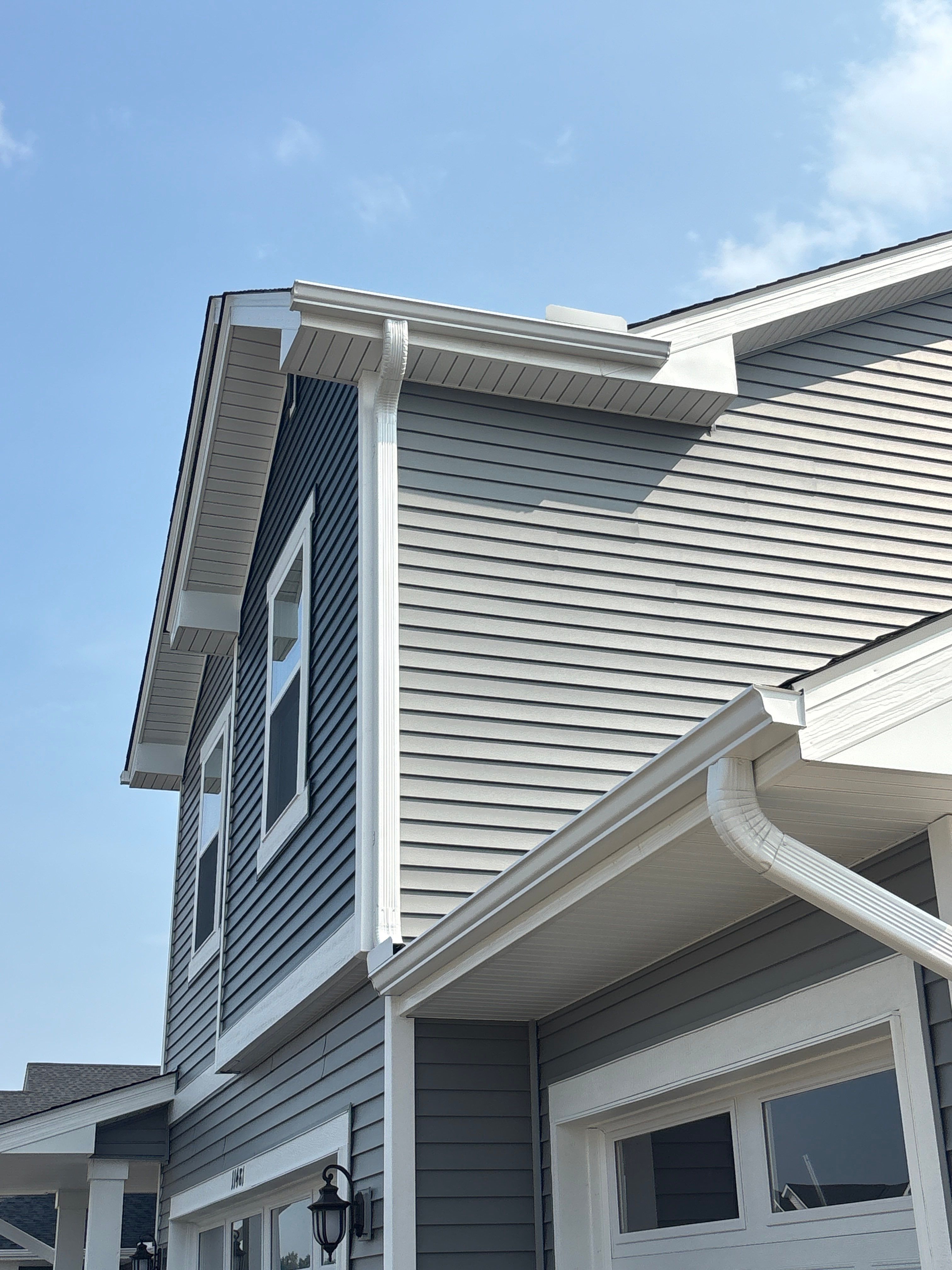 5-Inch White Seamless Gutter Installation – Otsego, MN by Next Level Seamless Gutters / Exteriors Inc.