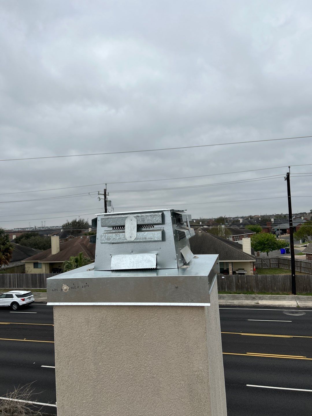 Residential Roofing Repair using Galvanized Chimney Cap & Chase by Lighthouse Roofing