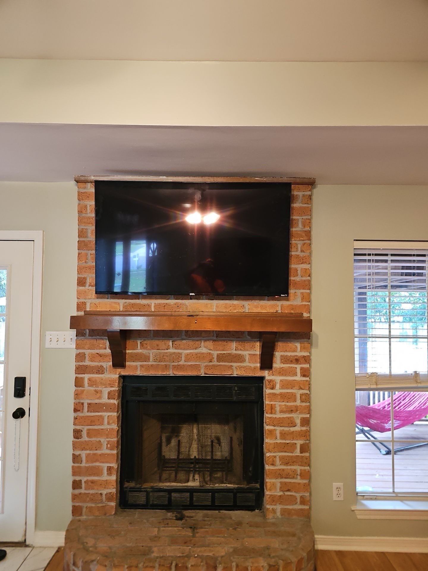 Fireplace TV Mounting Projects by Hangman Mounting & Installation 