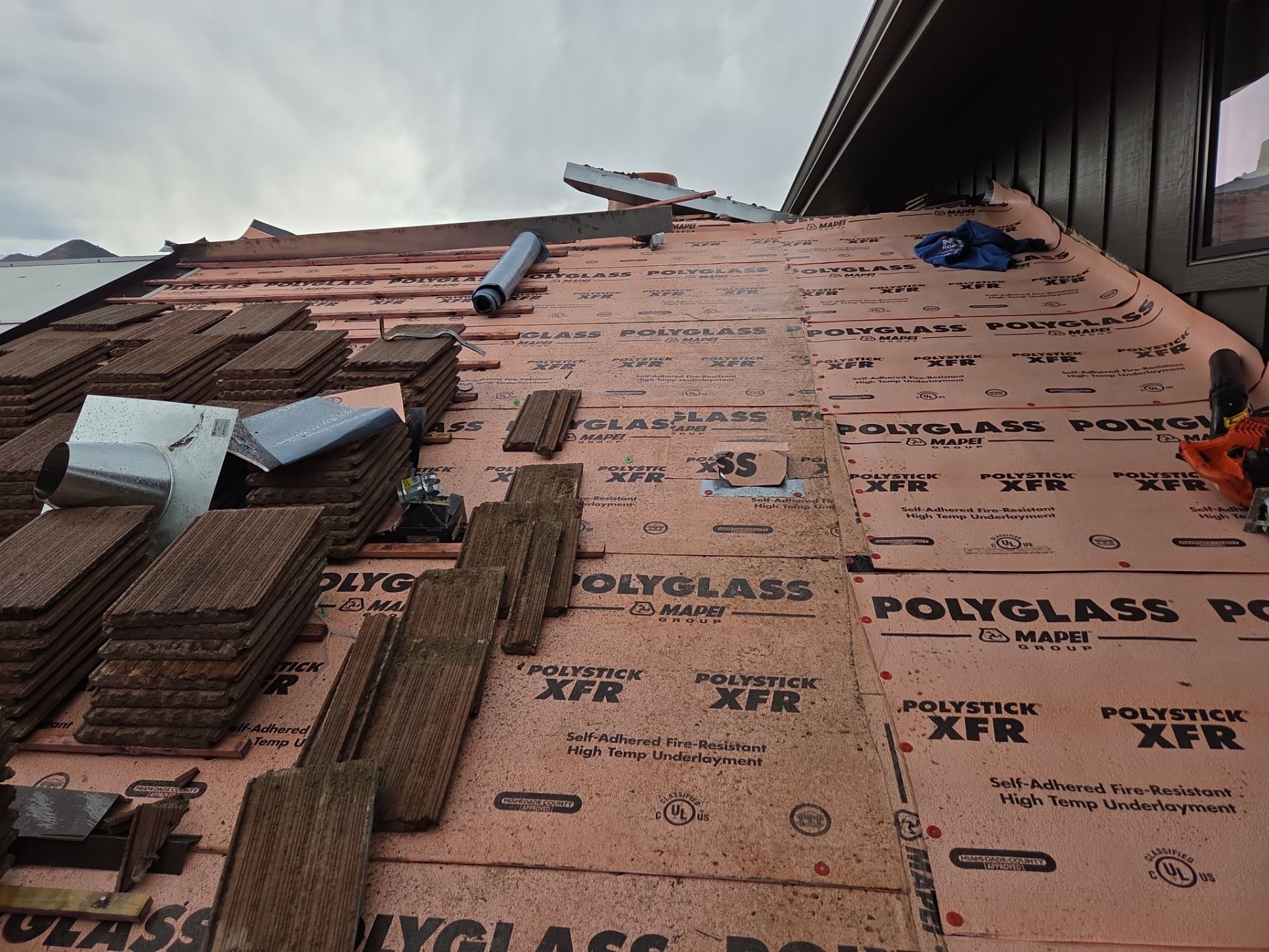 Tile roof by RTP Roofing Company