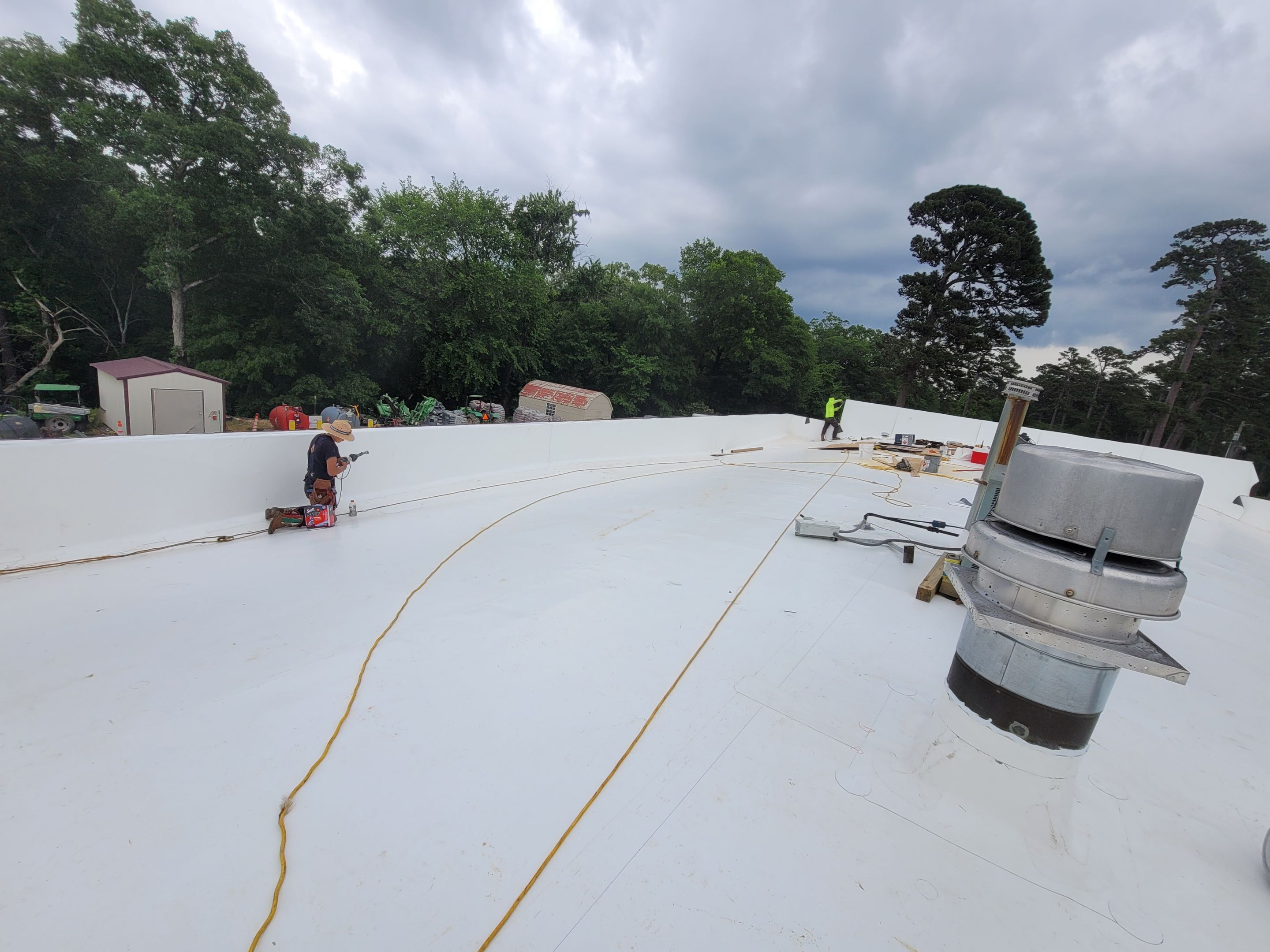 Choctaw Nation Healthcare Center - White Building by Hostetler Roofing