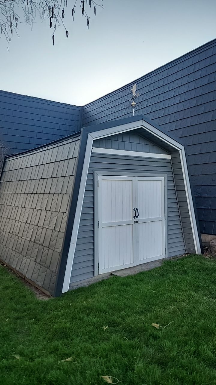 Metal Slate Shingle Roof in Sturgis, Michigan – “Darth Vader Helmet” Home by 4Ever Metal Roofing