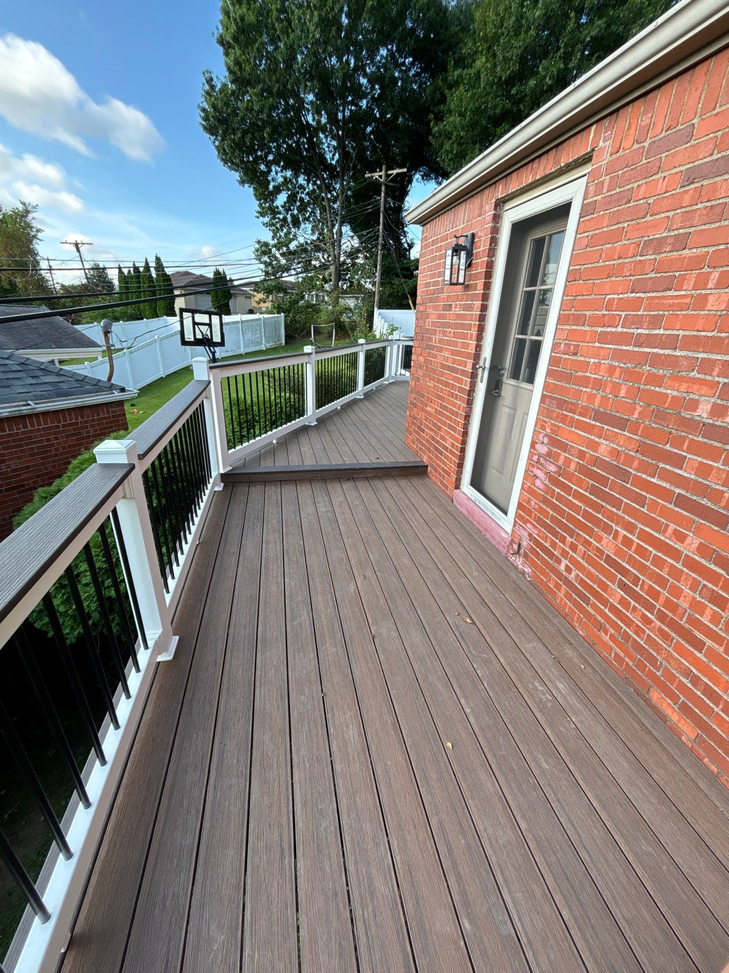2 tone Composite Re-Deck with Vinyl Railings in Pittsburgh by Cousins Roofing Siding & Decks