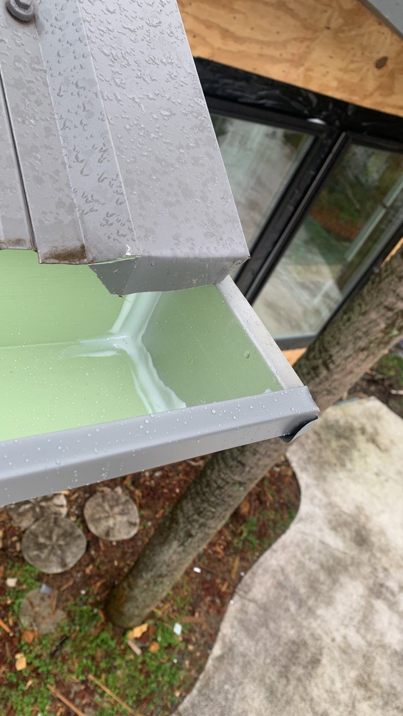 Seamless Gutter Installation using Charcoal Grey Gutters by Gutter Professors